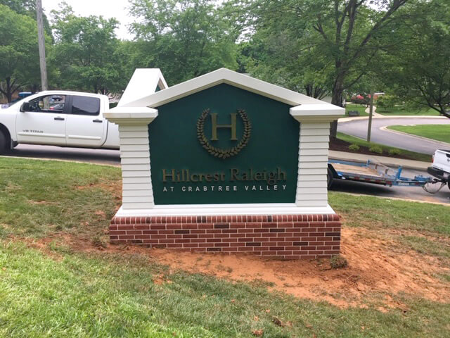 Custom molded faux masonry base and bronze titanium dimensional graphics • Hillcrest Raleigh at Crabtree Valley (nursing and rehabilitative care) • Raleigh, NC