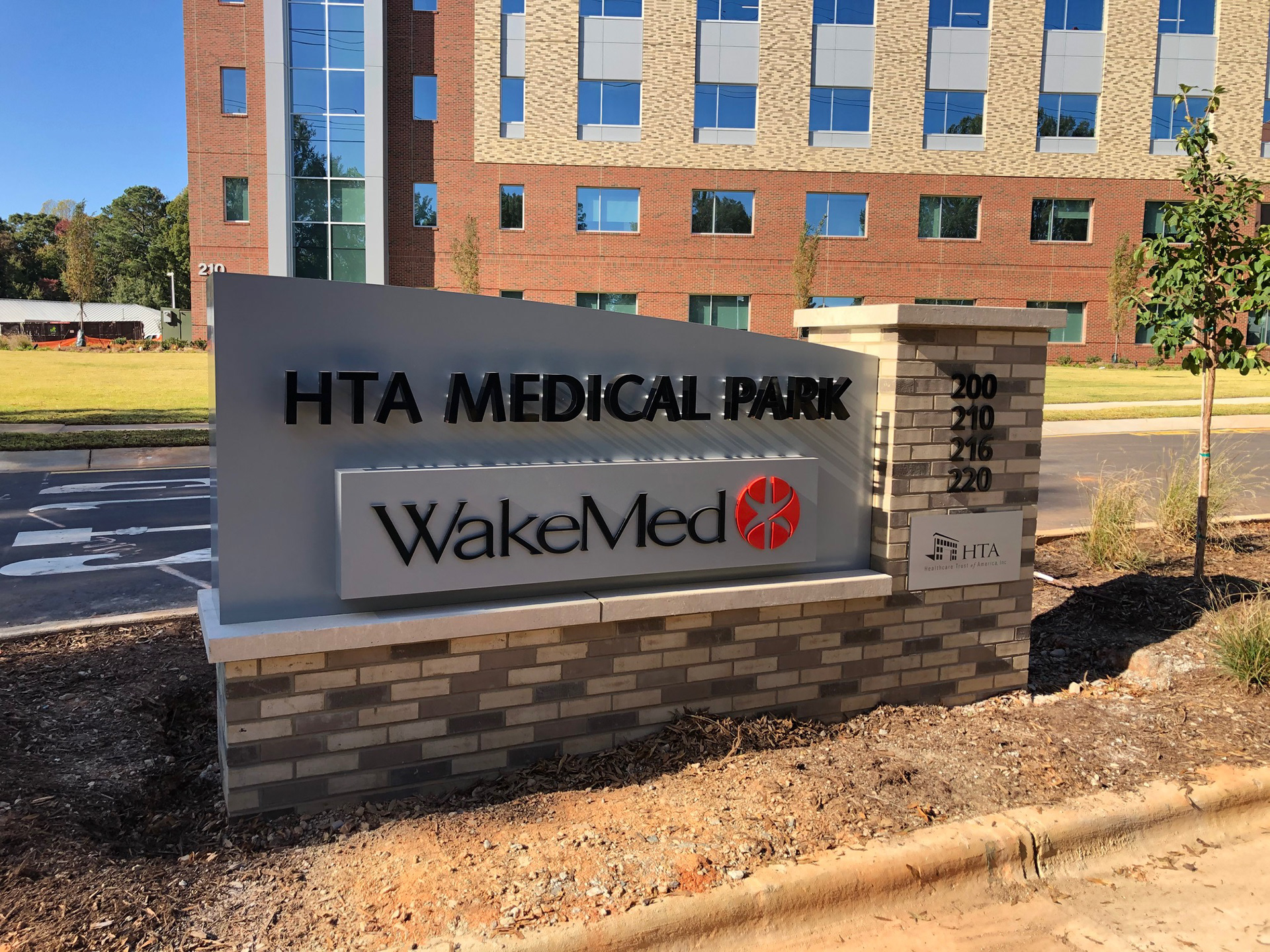 Aluminum and brick monument with halo illuminated graphics • WakeMed / HTA Medical Park of Cary •  Cary, NC