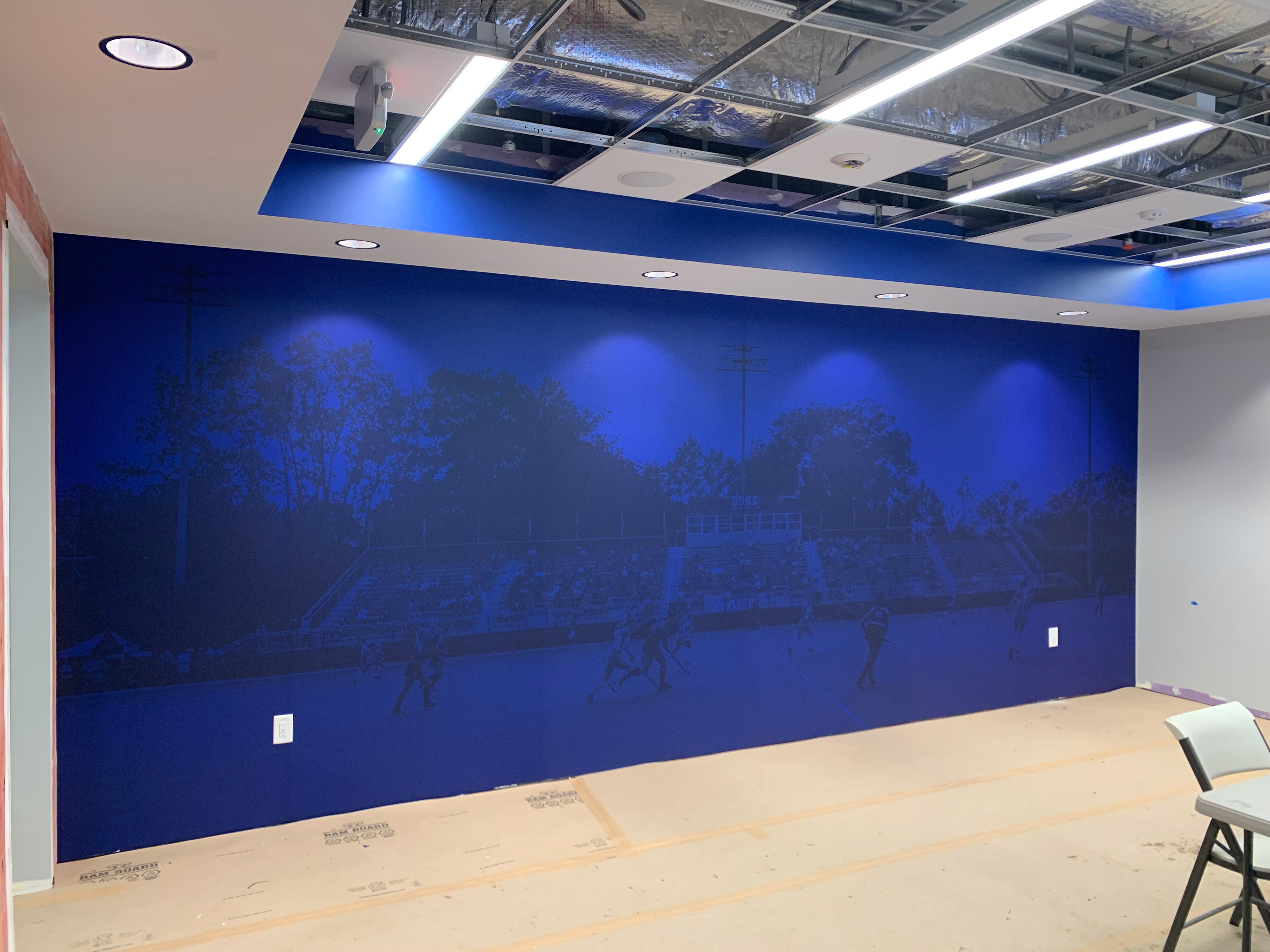 Duke Field Hockey • Lounge, step 1: wall mural (large format digital print)