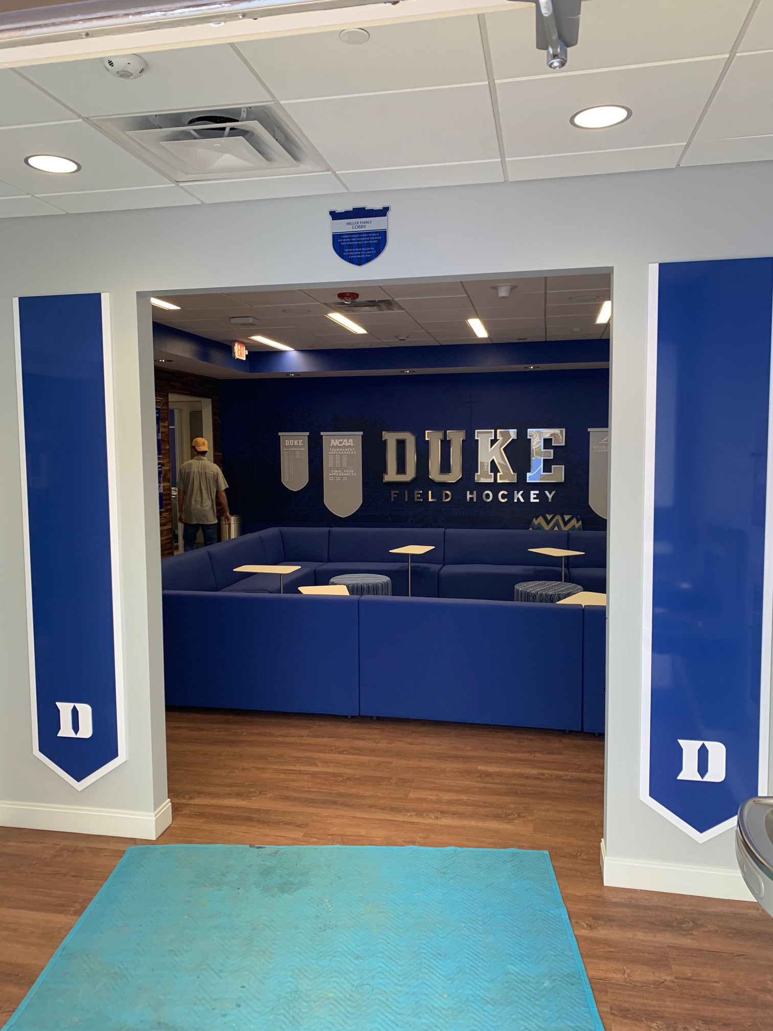 Duke Field Hockey • Lobby/Lounge Entryway with Large Vertical Side Banners (acrylic) and Miller Family Donor Plaque