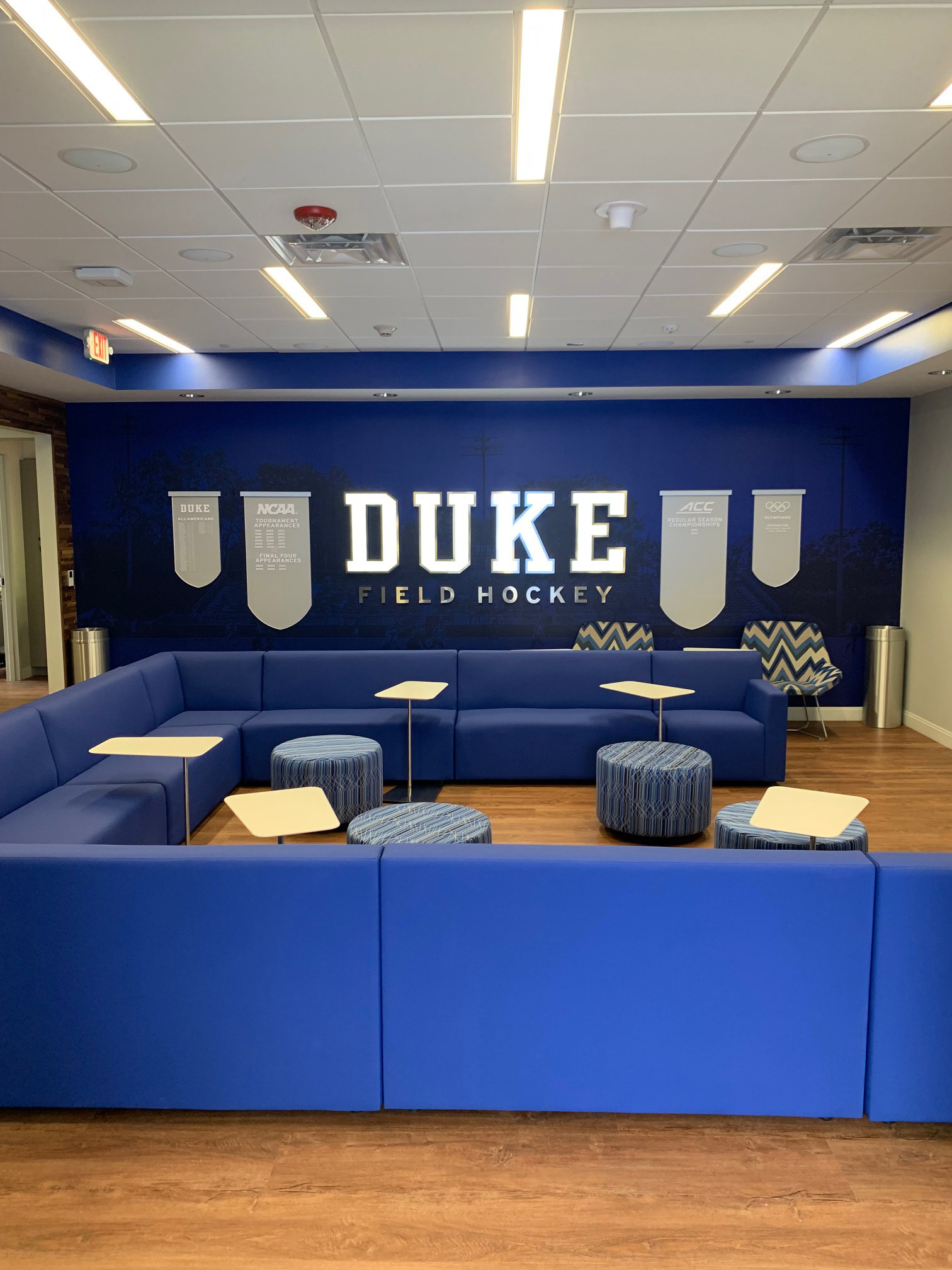 Duke Field Hockey • Lounge, step 3: accolades (clear, non-glare acrylic w/ matte white vinyl text, 1st surface)
