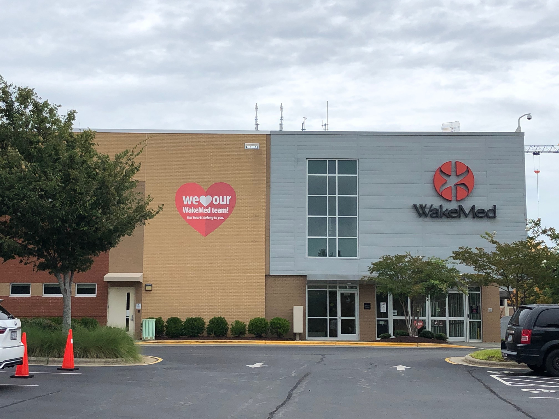 WakeMed Brier Creek Healthplex • rear entrance illuminated logo and employee appreciation wall graphic • Raleigh, NC