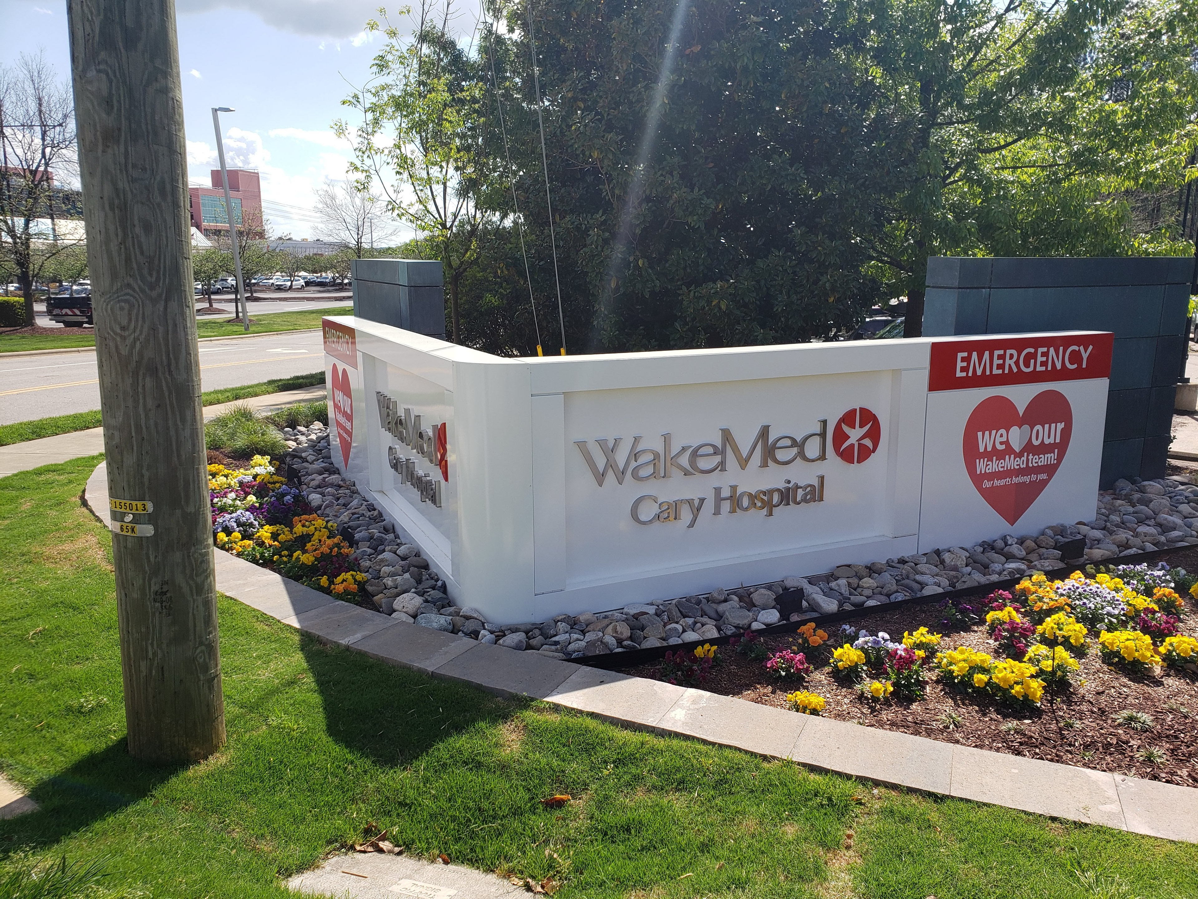 Aluminum corner monument with stainless steel graphics and external ground lighting • WakeMed Cary Hospital • Cary, NC