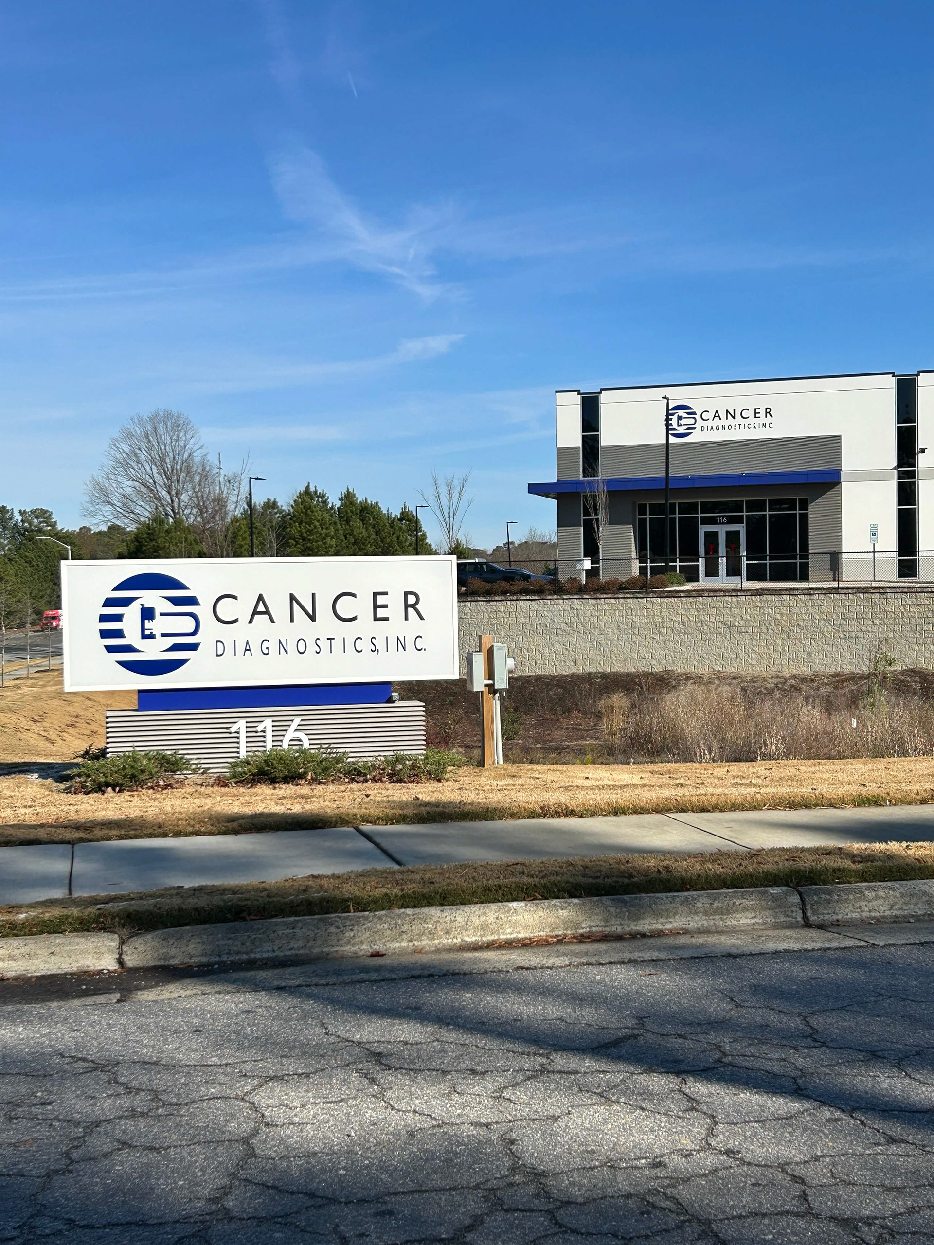 Primary monument (internally illuminated) and building exterior logo • Cancer Diagnostics • Durham, NC