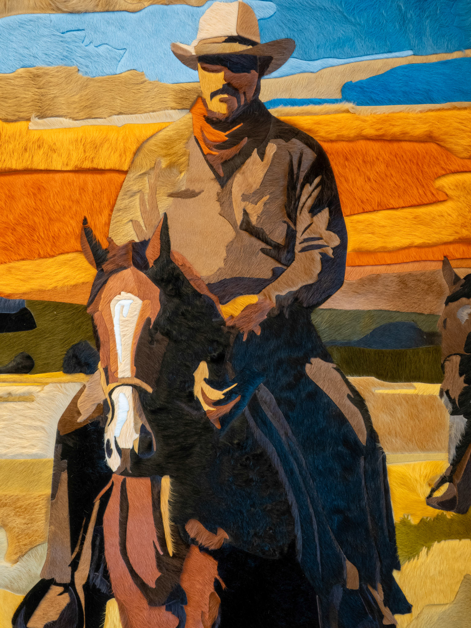 Closeup of Cowhide mural inside Petry Boardroom