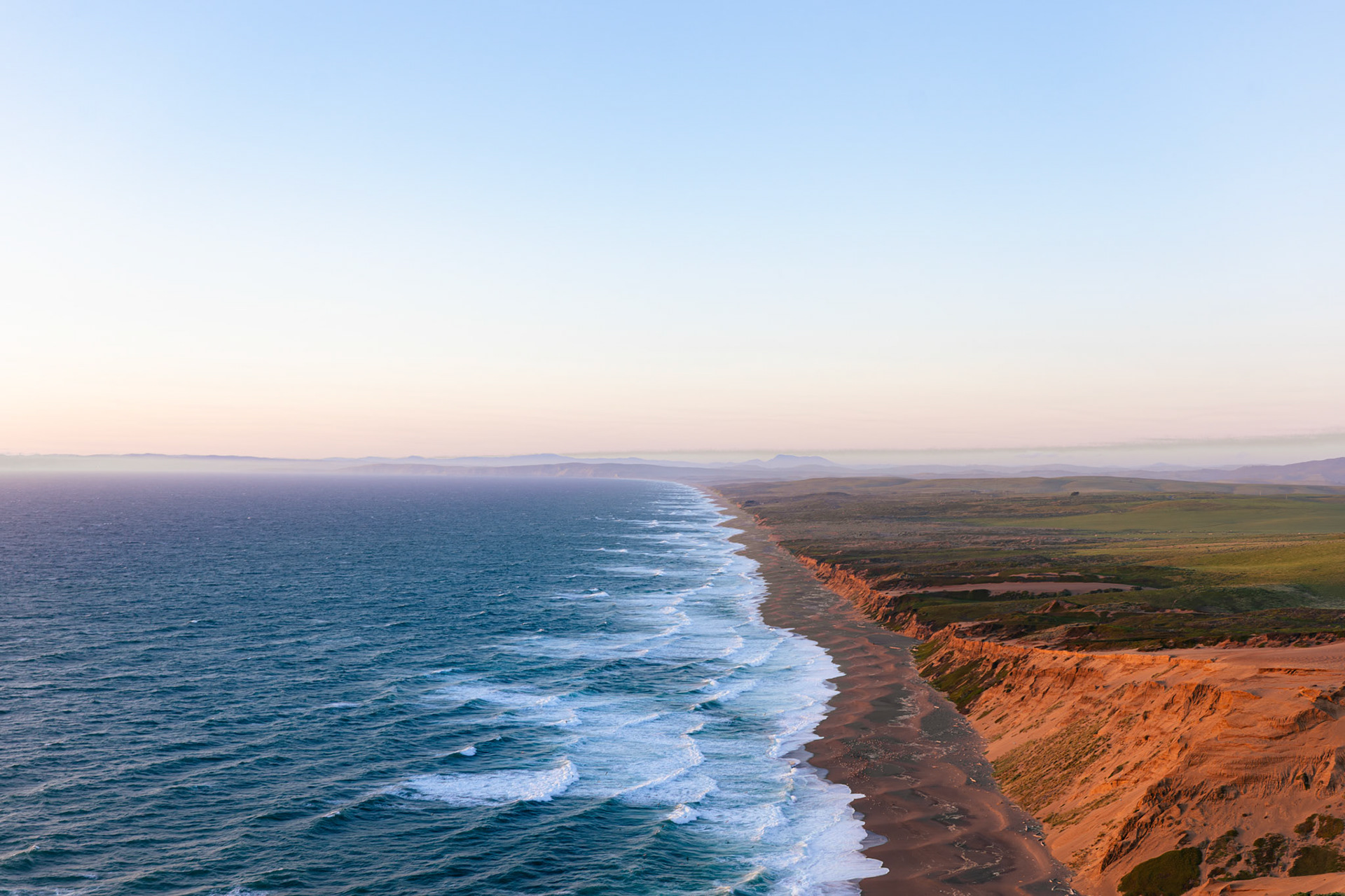 Sunlight touched the sand; everything beyond it belonged to immensity | Pacific Ocean, California