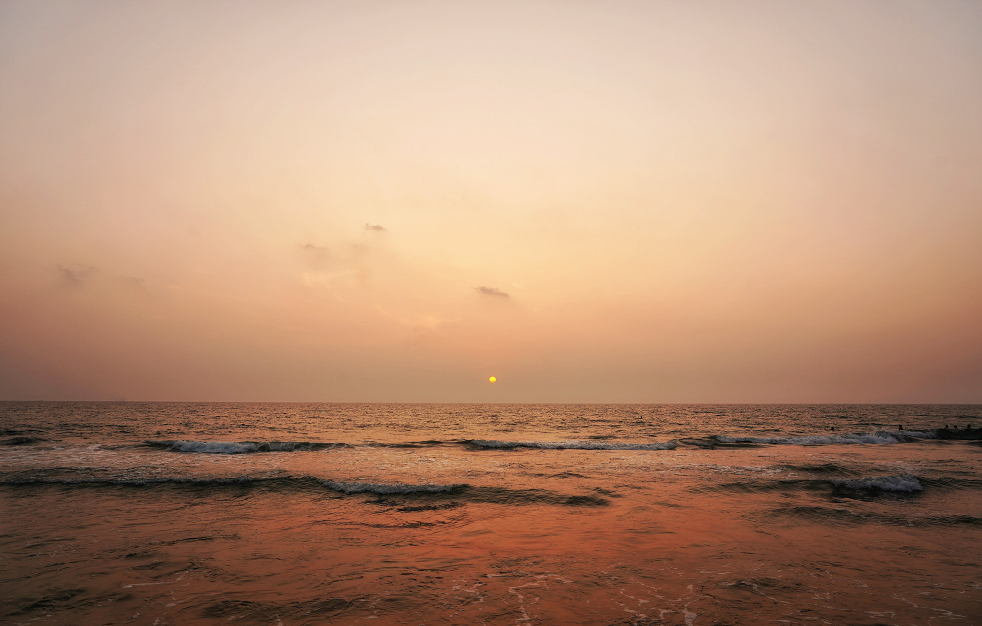 A horizon holding the sun the way memory holds what it cannot keep | Goa, India