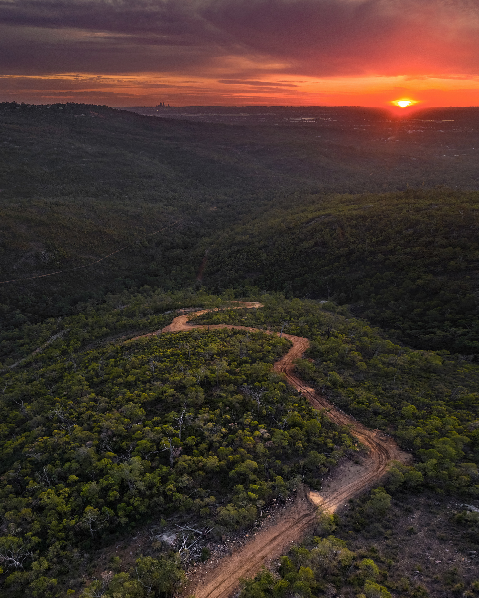 A winding dirt road leads to one of the most spectacular sunset viewing locations in the Perth Hills WA.