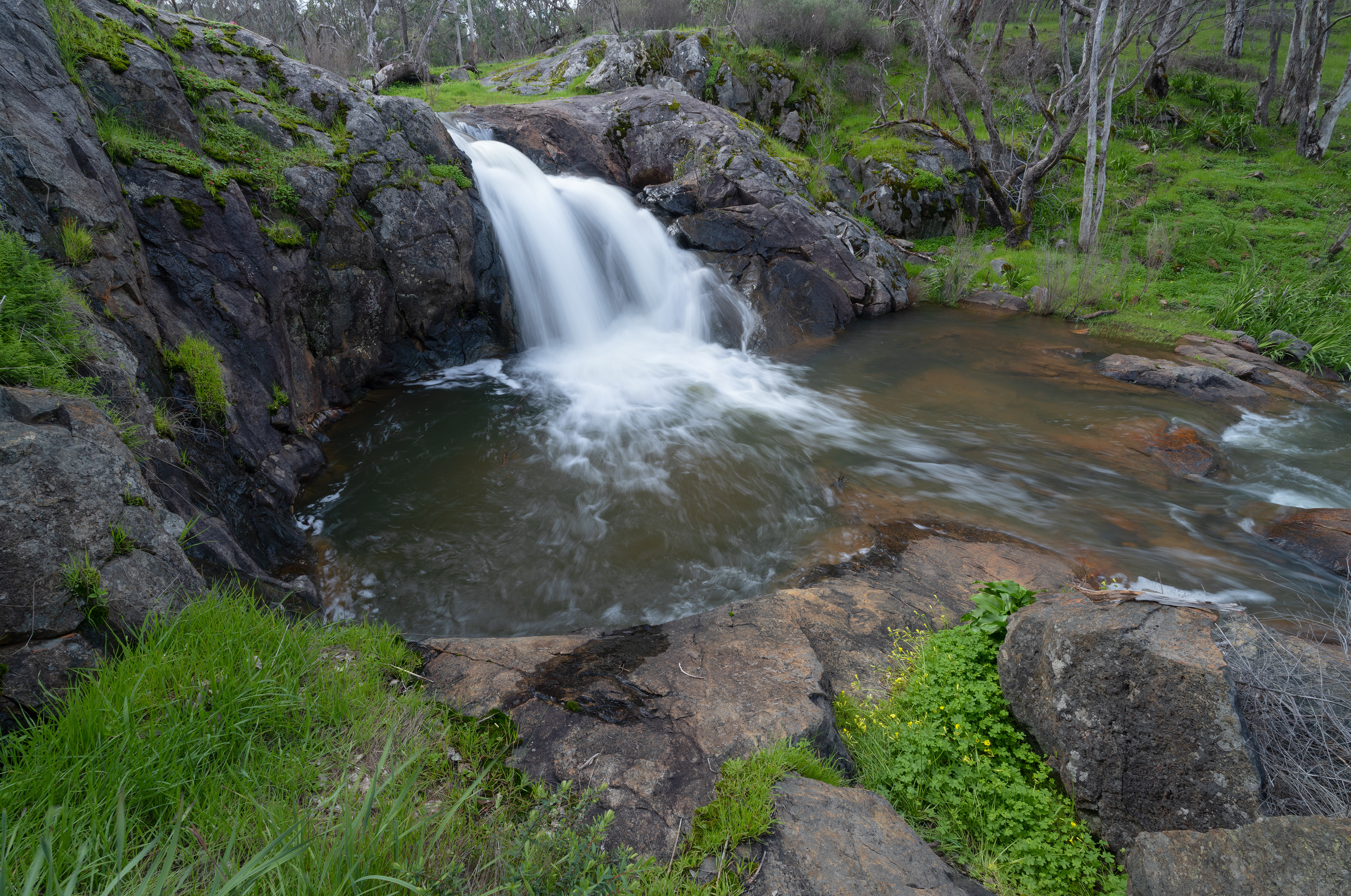 A picturesque waterfall in Serpentine National Park, WA.