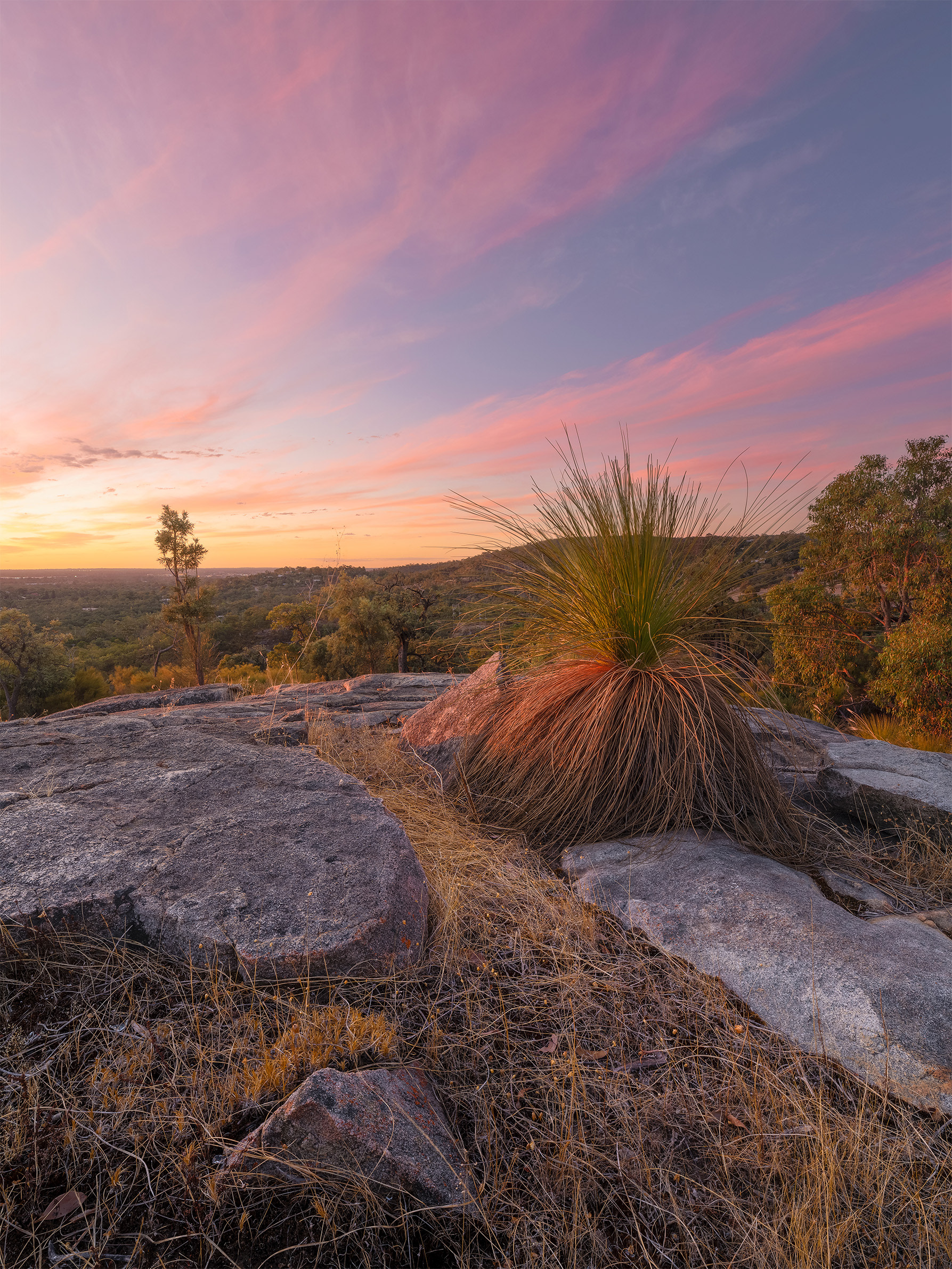 An exposure bracketed/blended photograph of a Perth Hills sunset.