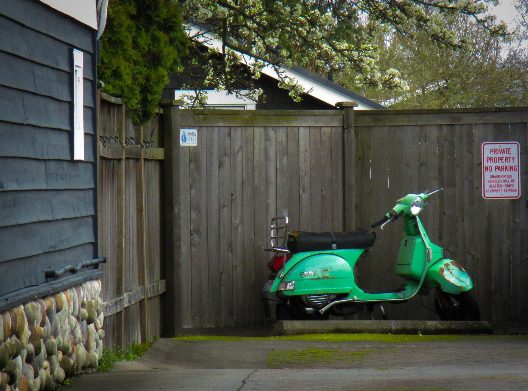 Old Vespa scooter on 20th Ave. near East Olive St.
