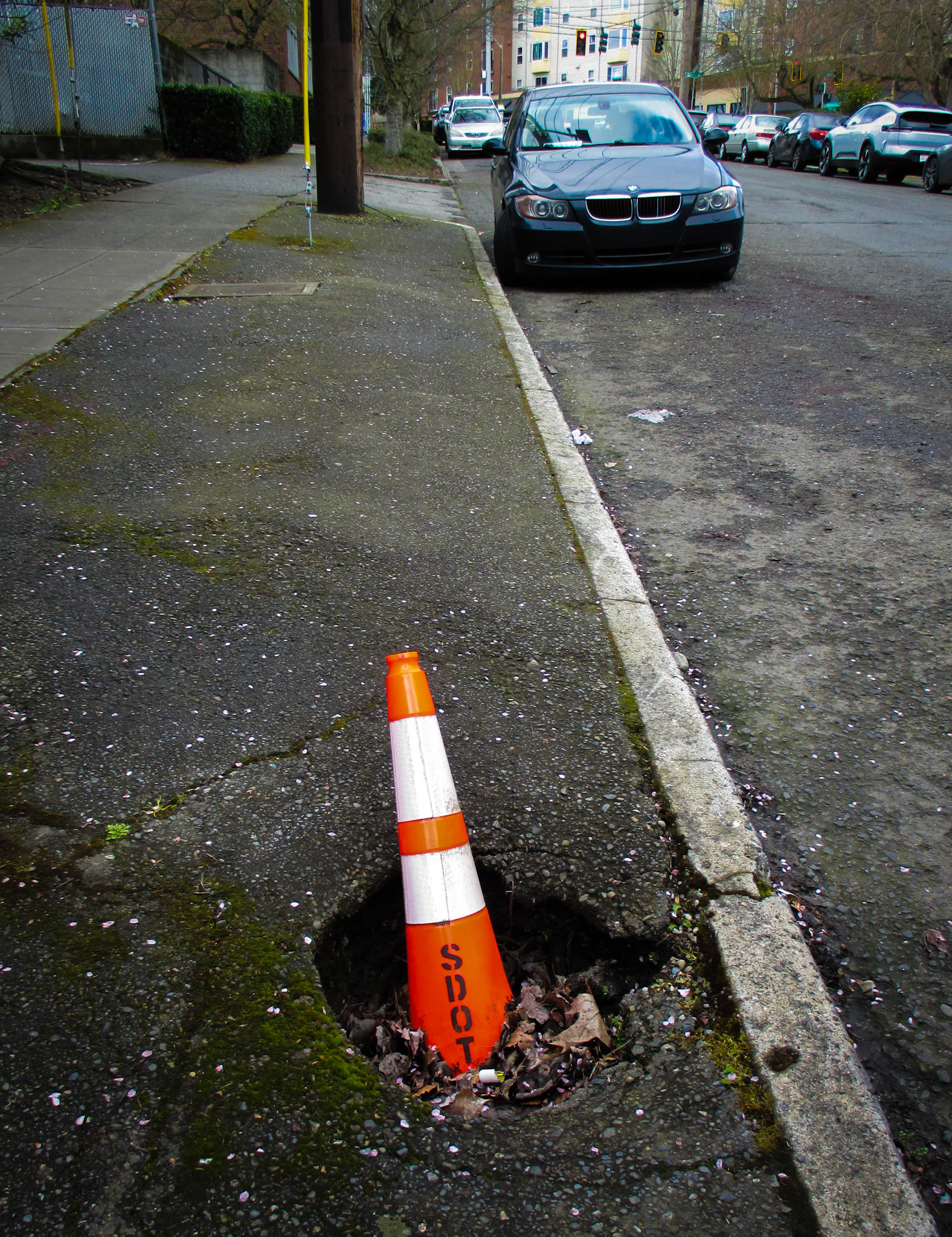 Caution, Hole, 21st Ave. and East Olive st.