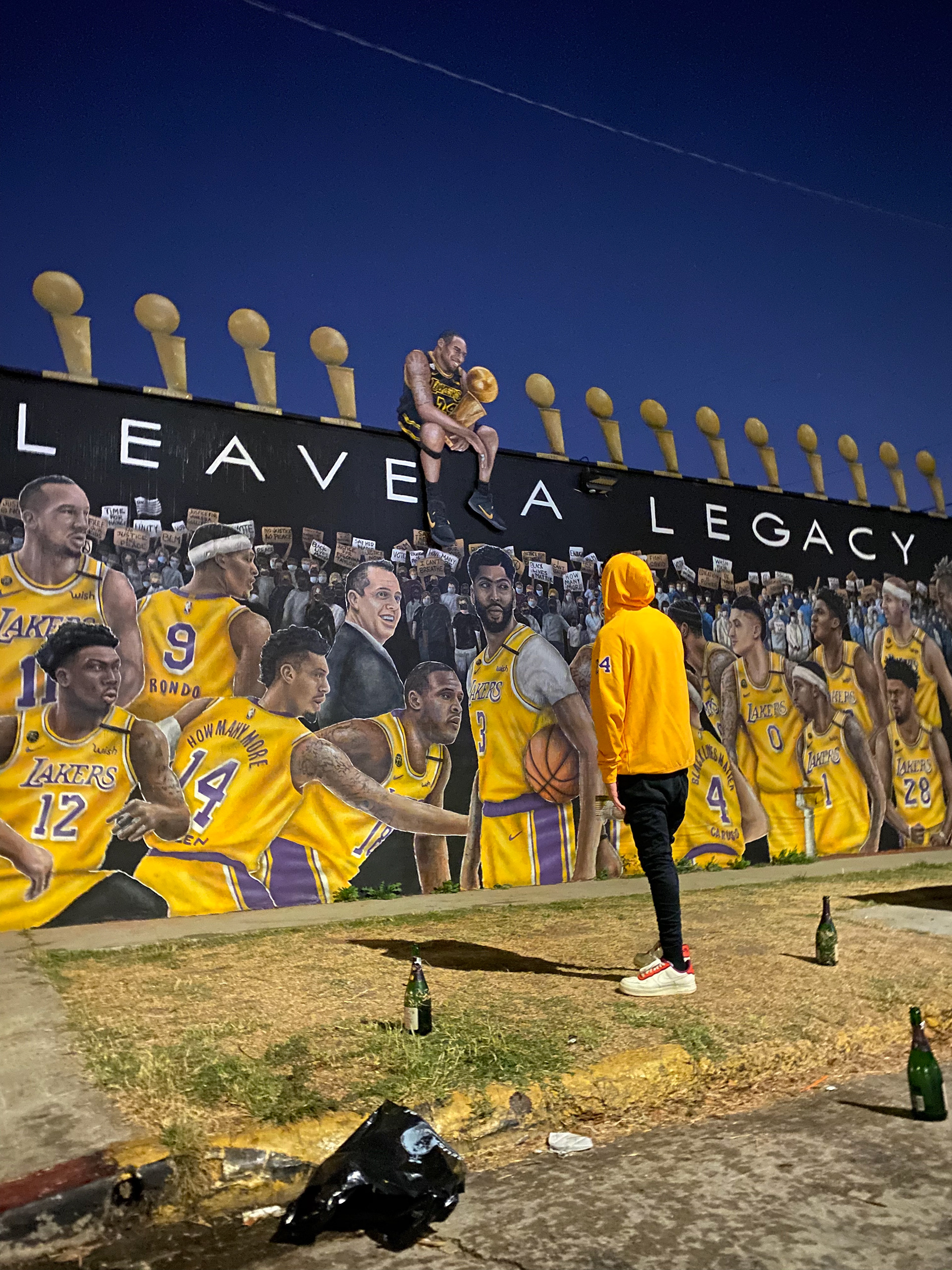 Aron admiring a mural in LA