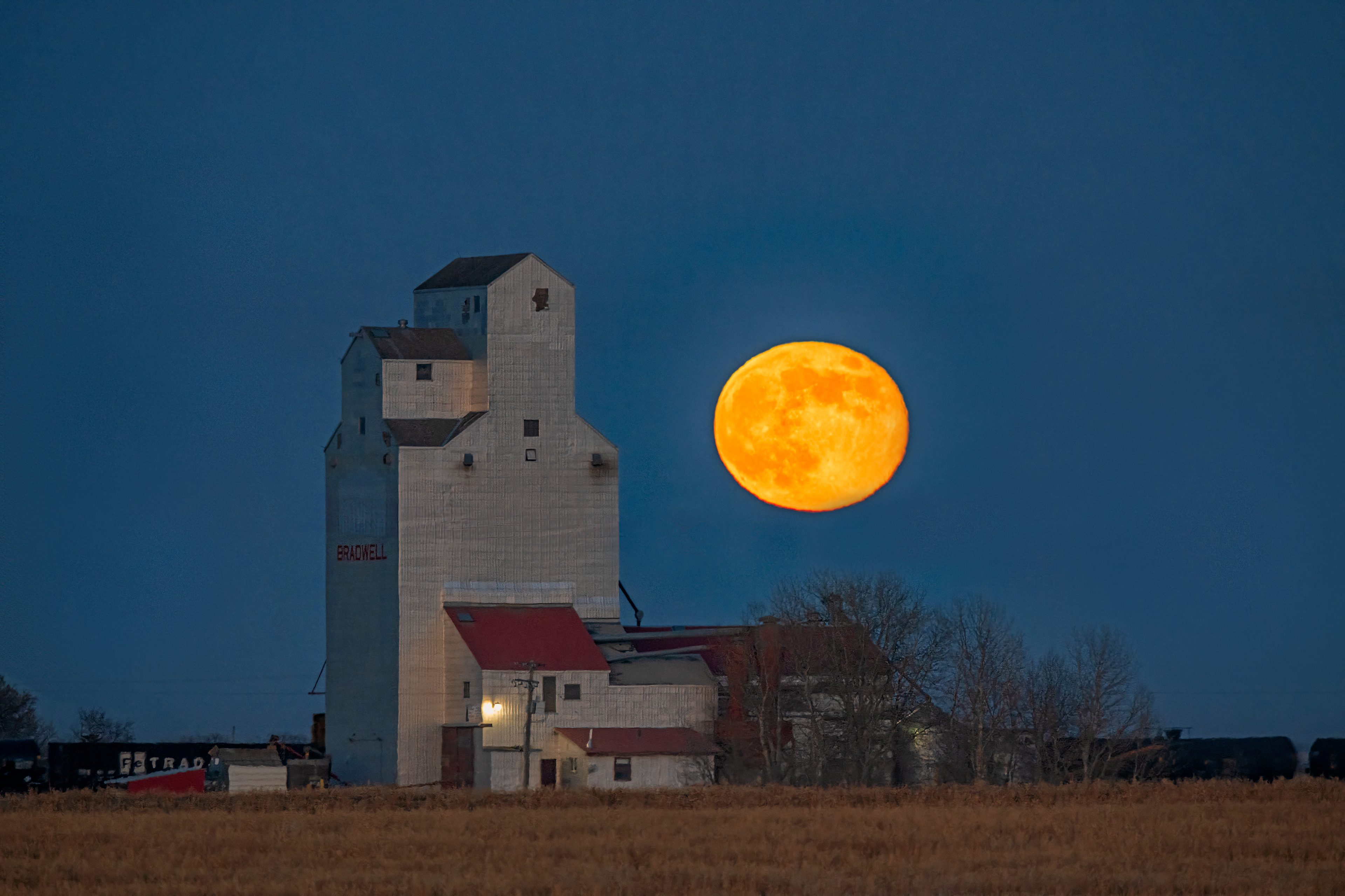Moonrise, grain elevator