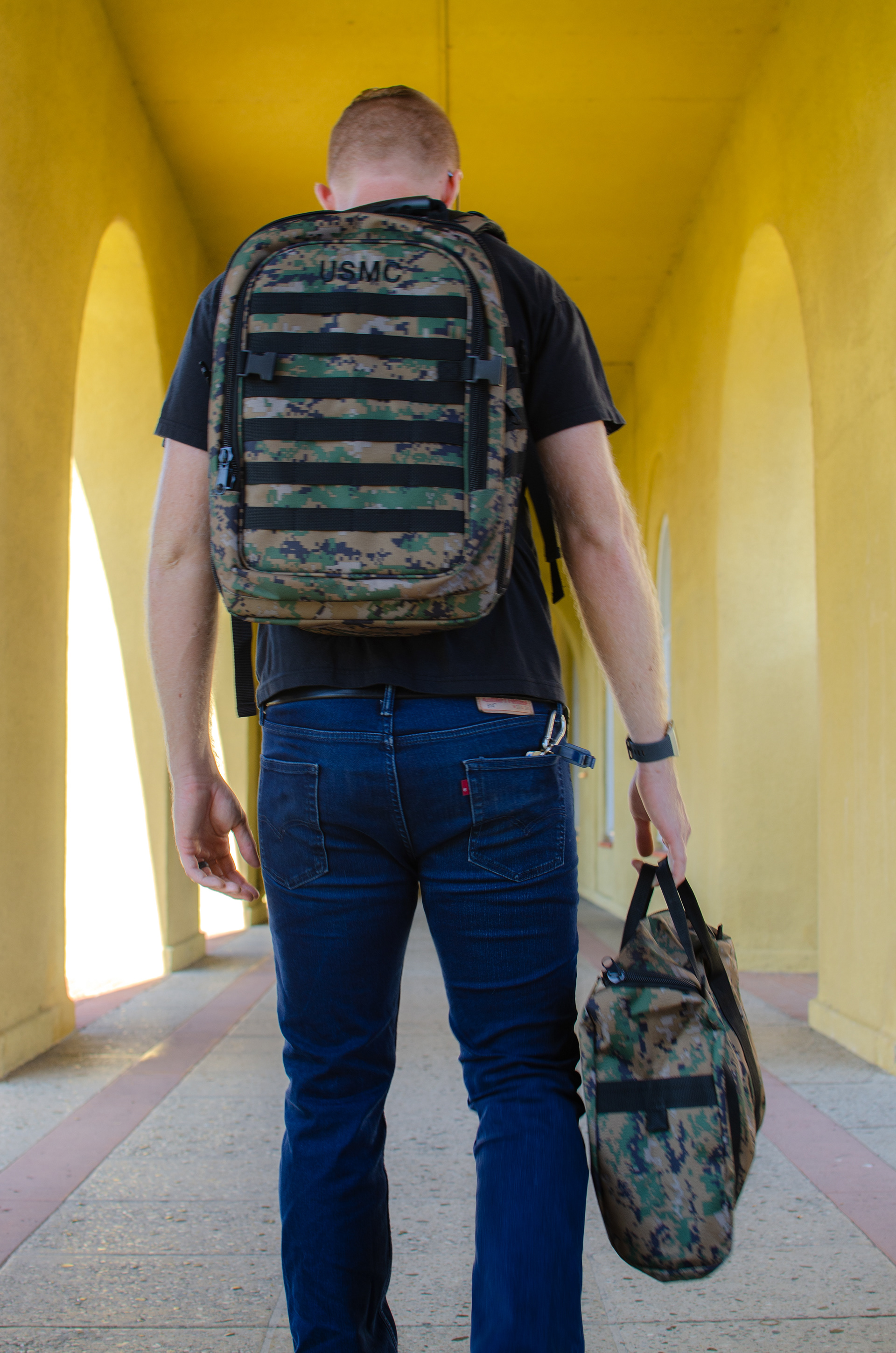 Director of Products and Services modeling bags