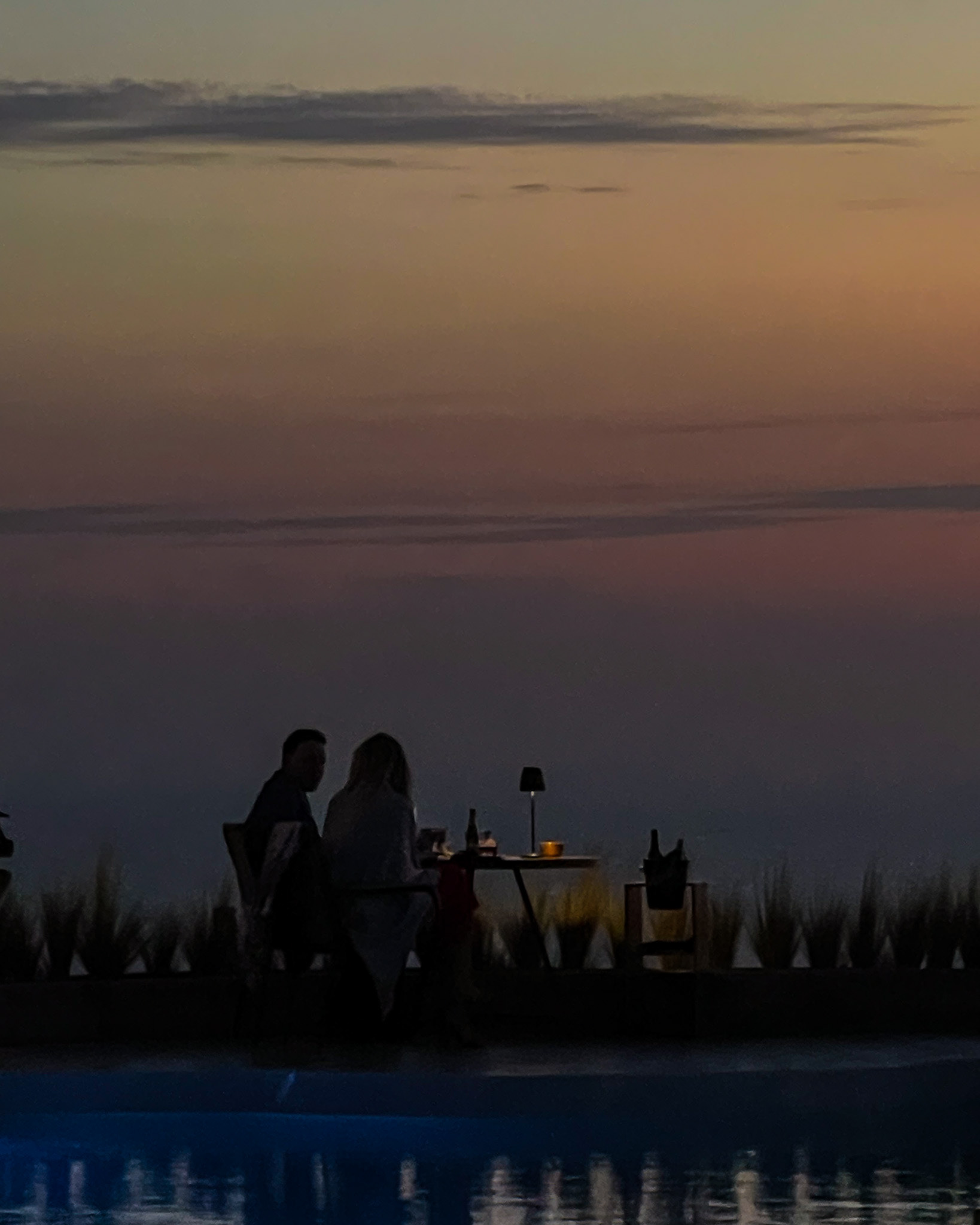 After days of family adventures, an evening made for two — soft light, good wine, and the promise of another beautiful tomorrow