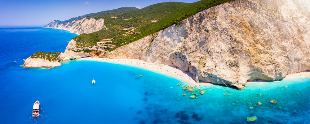 Porto Katsiki Beach on Lefkada’s west coast — a must-see during any villa holiday in Lefkada, famous for its white cliffs, turquoise water and dramatic Ionian views