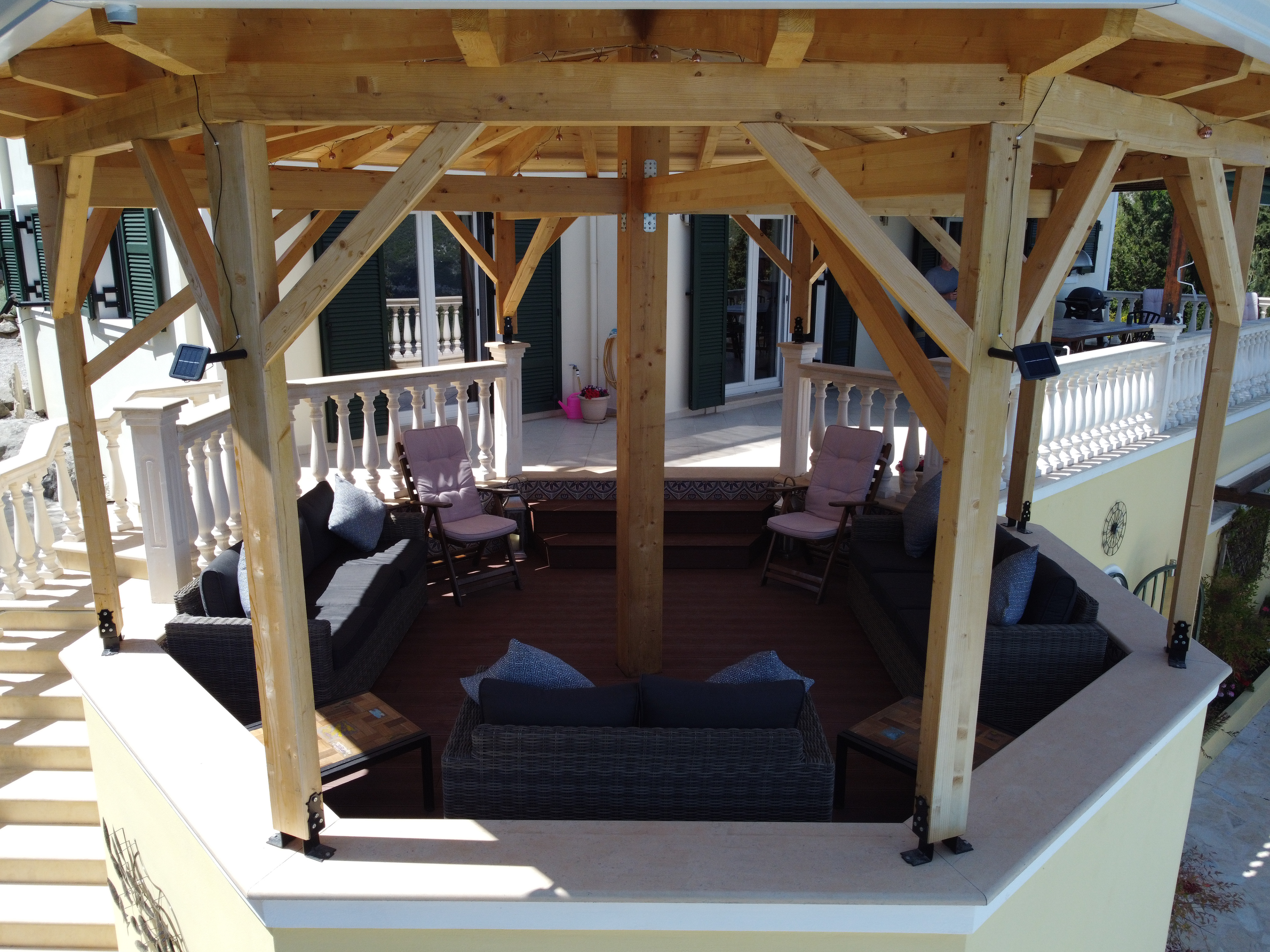 Shaded pergola lounge – cool drinks, family chats, and lazy afternoons