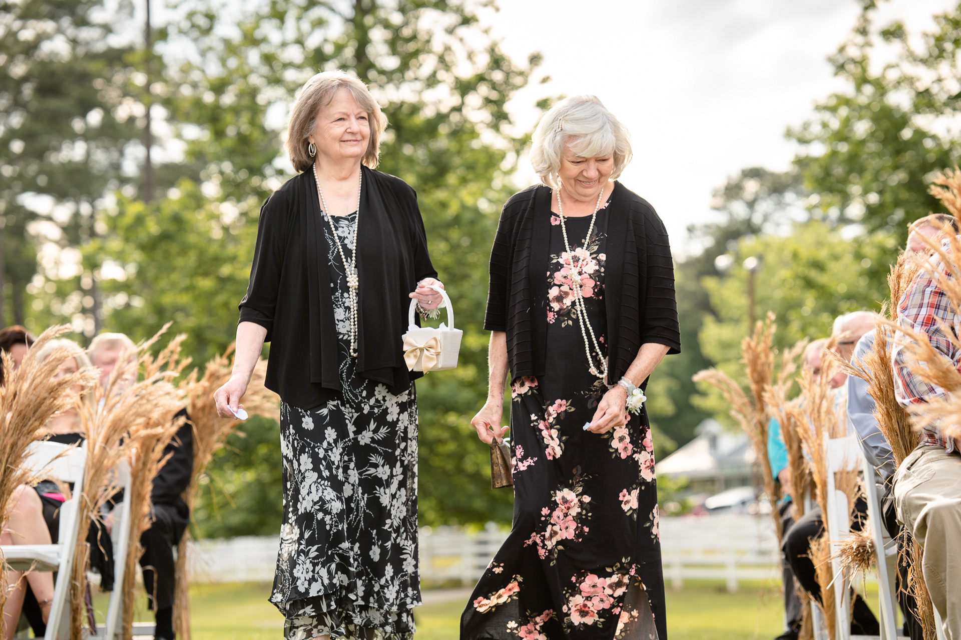 Grandmothers leaving petals in the aisle