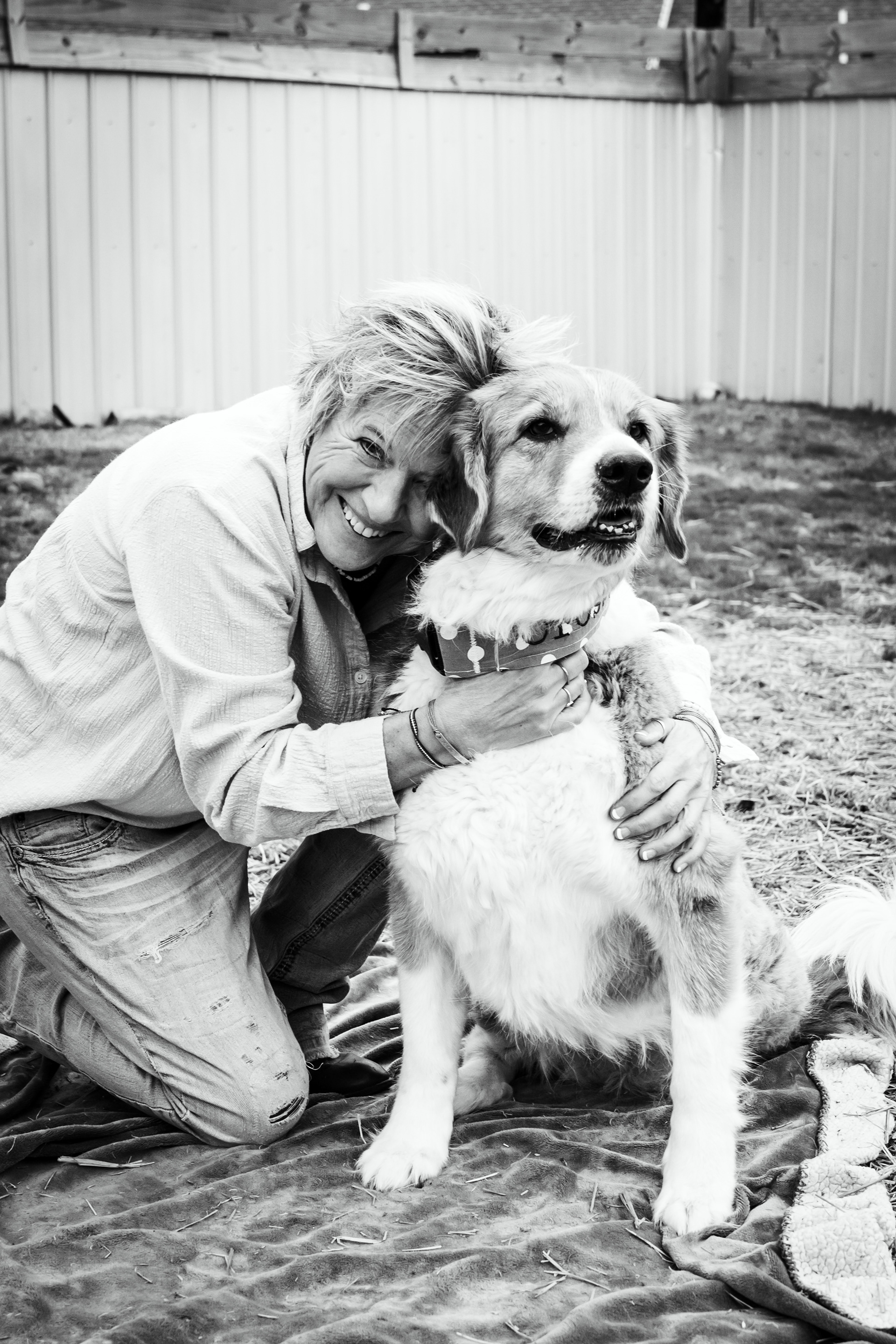 Dog mom gives her fur baby a hug