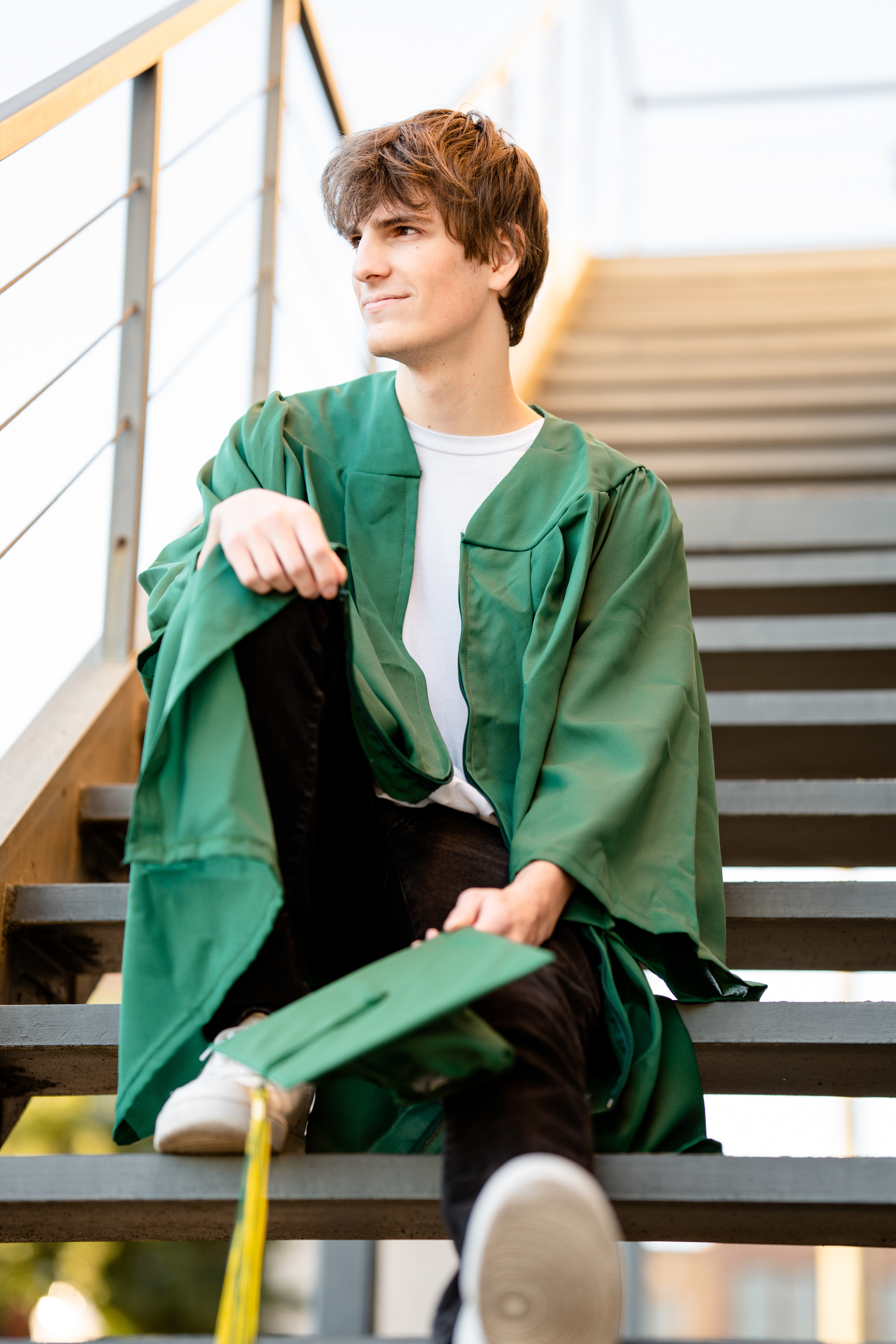 Senior boy on stairs in urban area