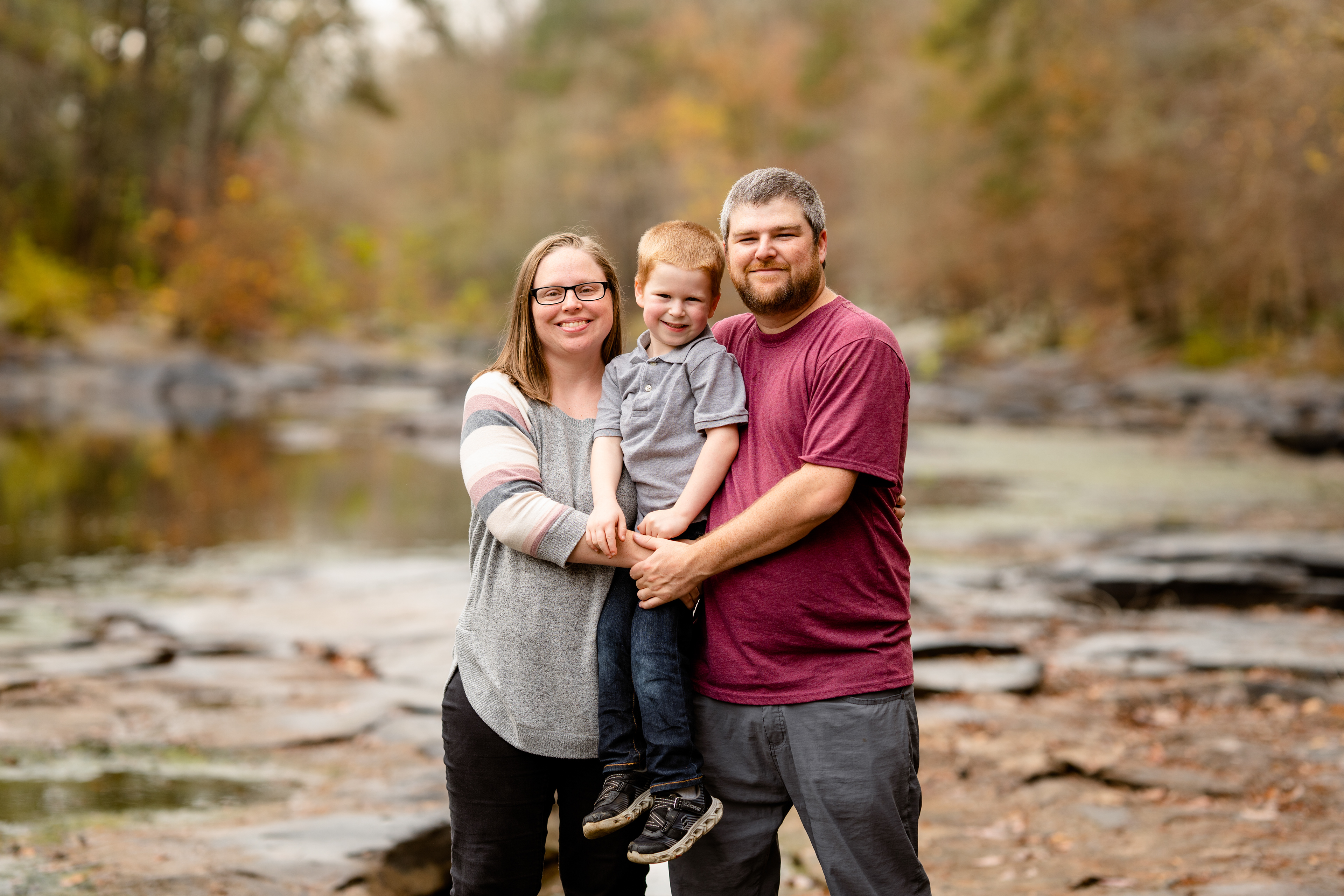 Family photo at river's edge