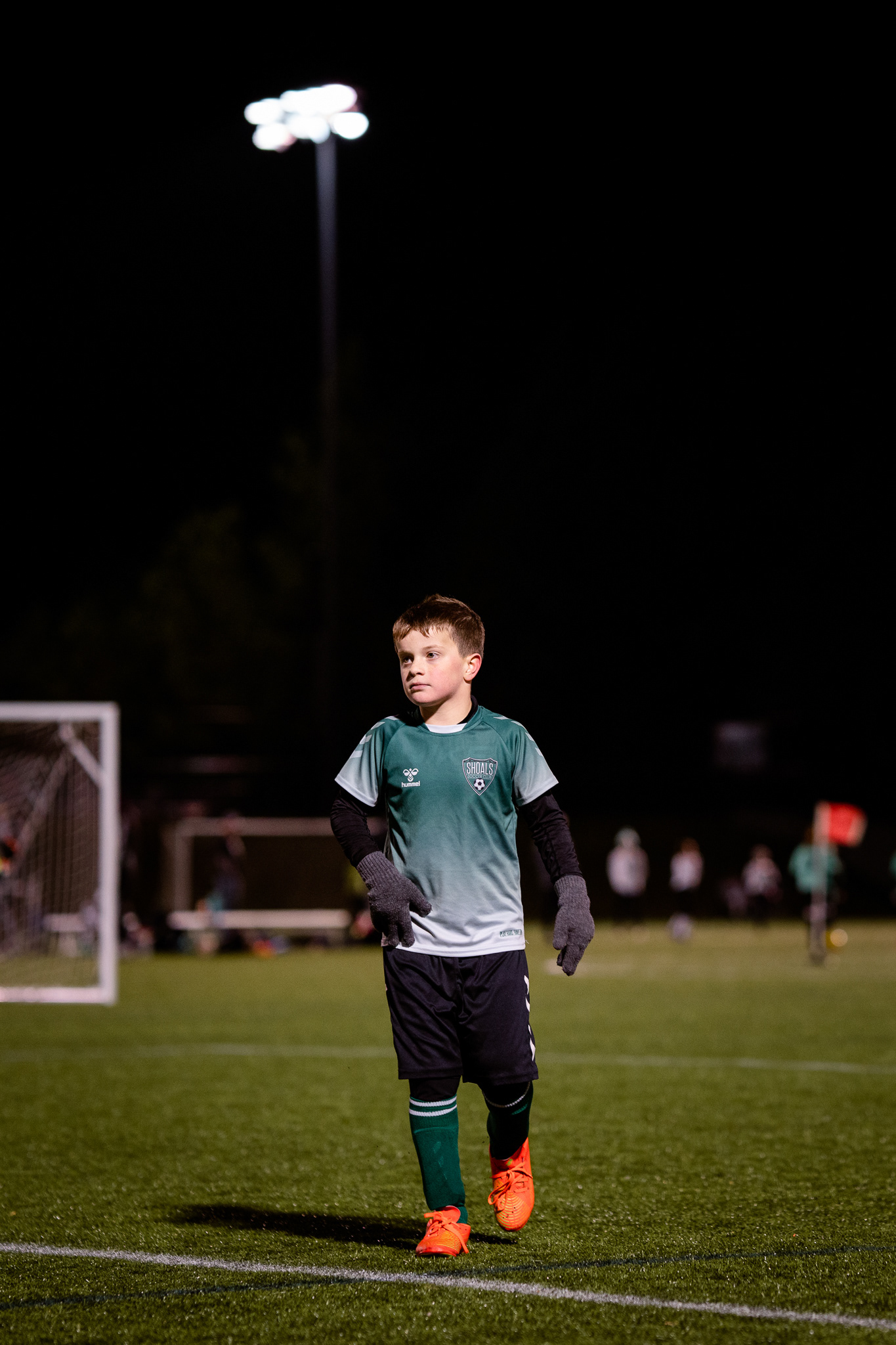 Defense running to the soccer ball
