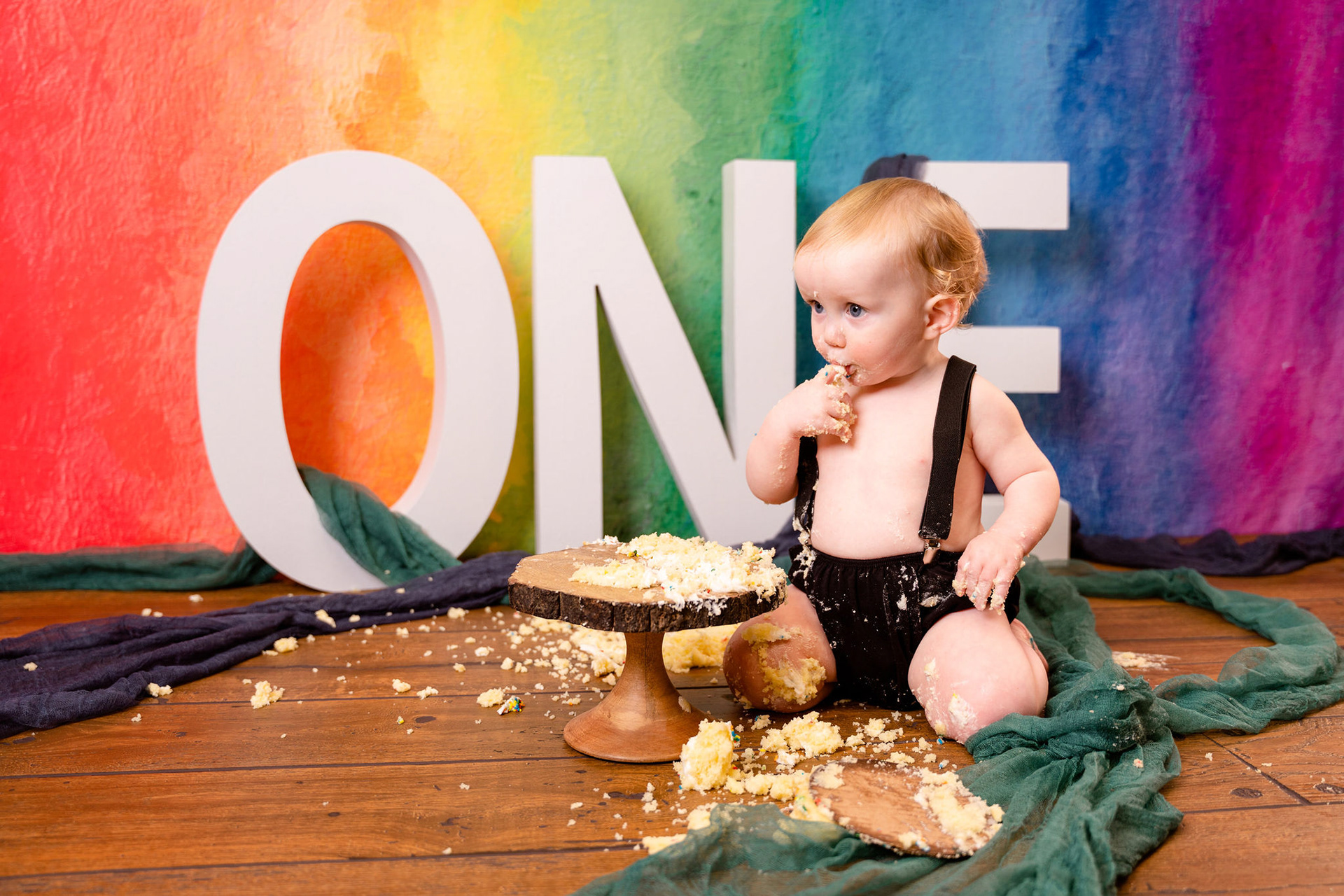 Rainbow baby celebrates his first birthday with a delicious smash cake
