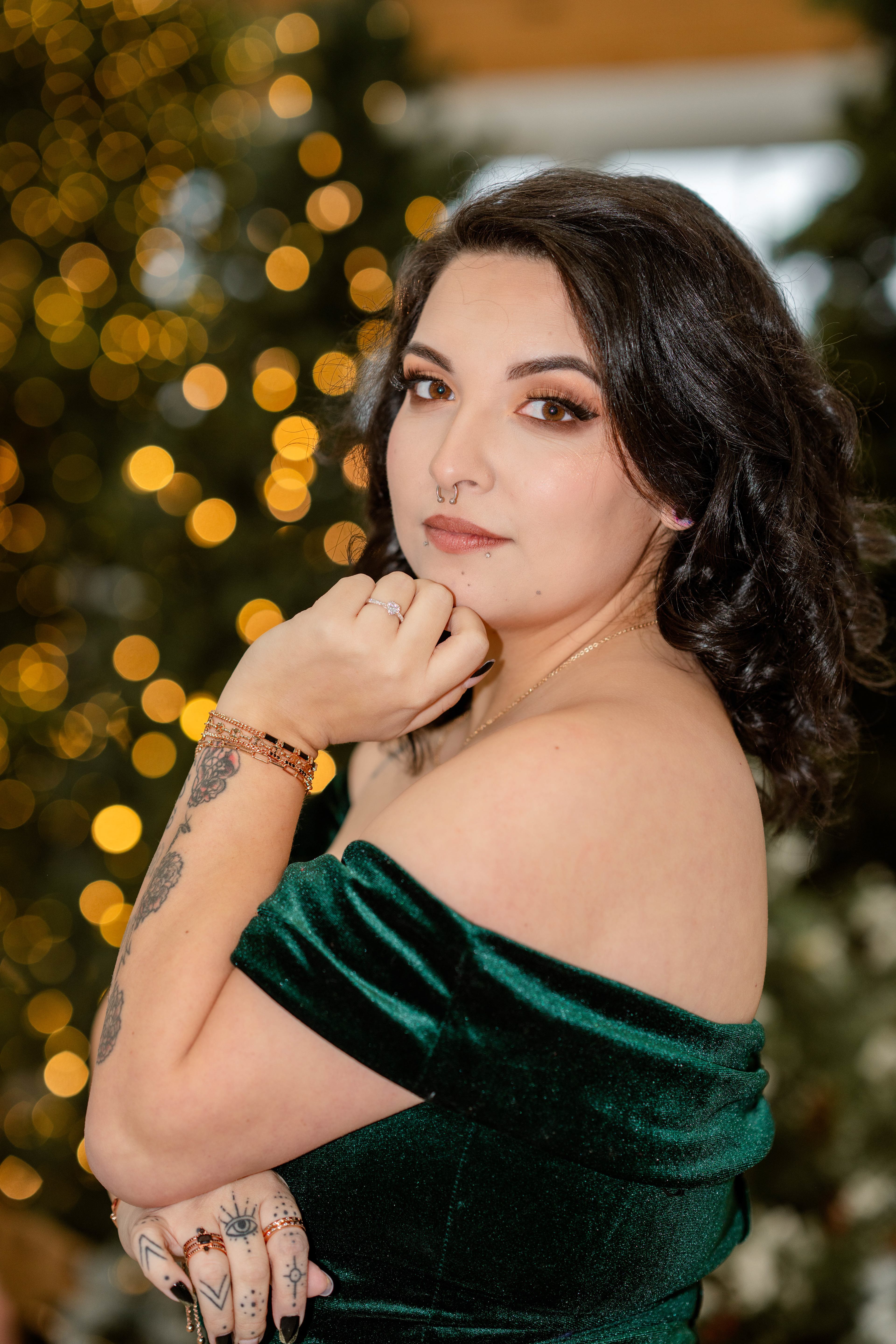 Newly engaged woman poses with engagement ring