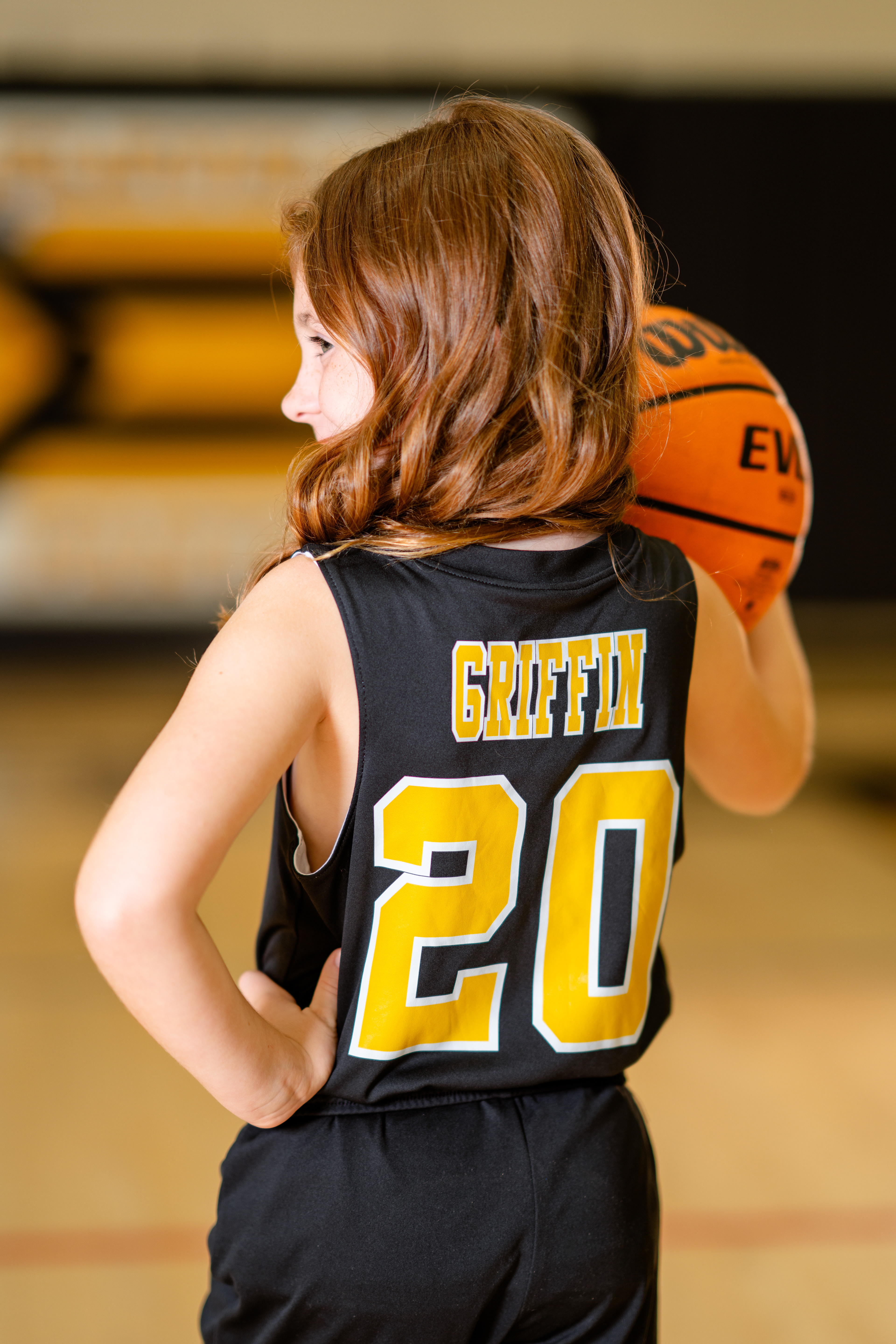 Youth basketball portrait on basketball court