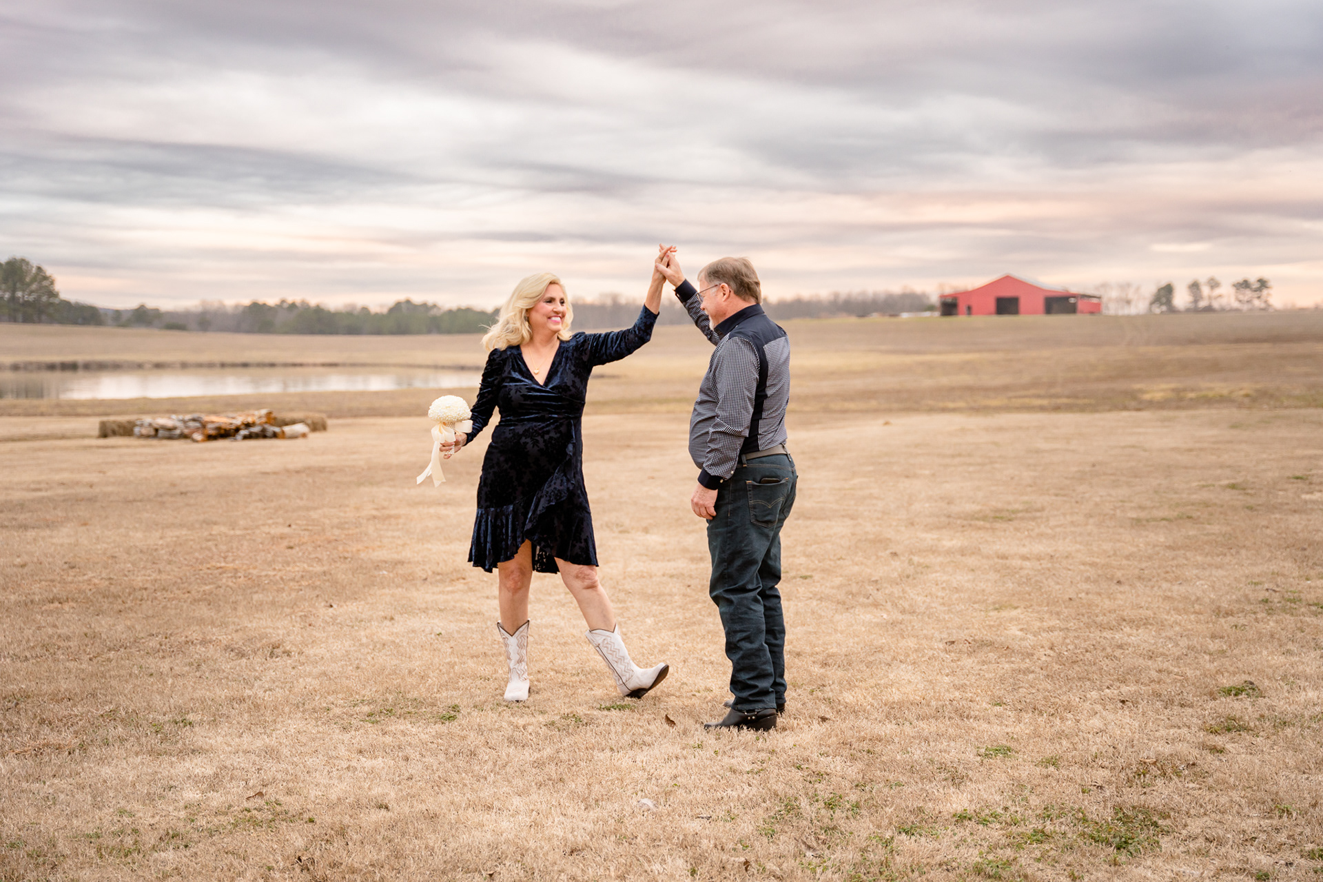 Dancing in a field before the wedding ceremony