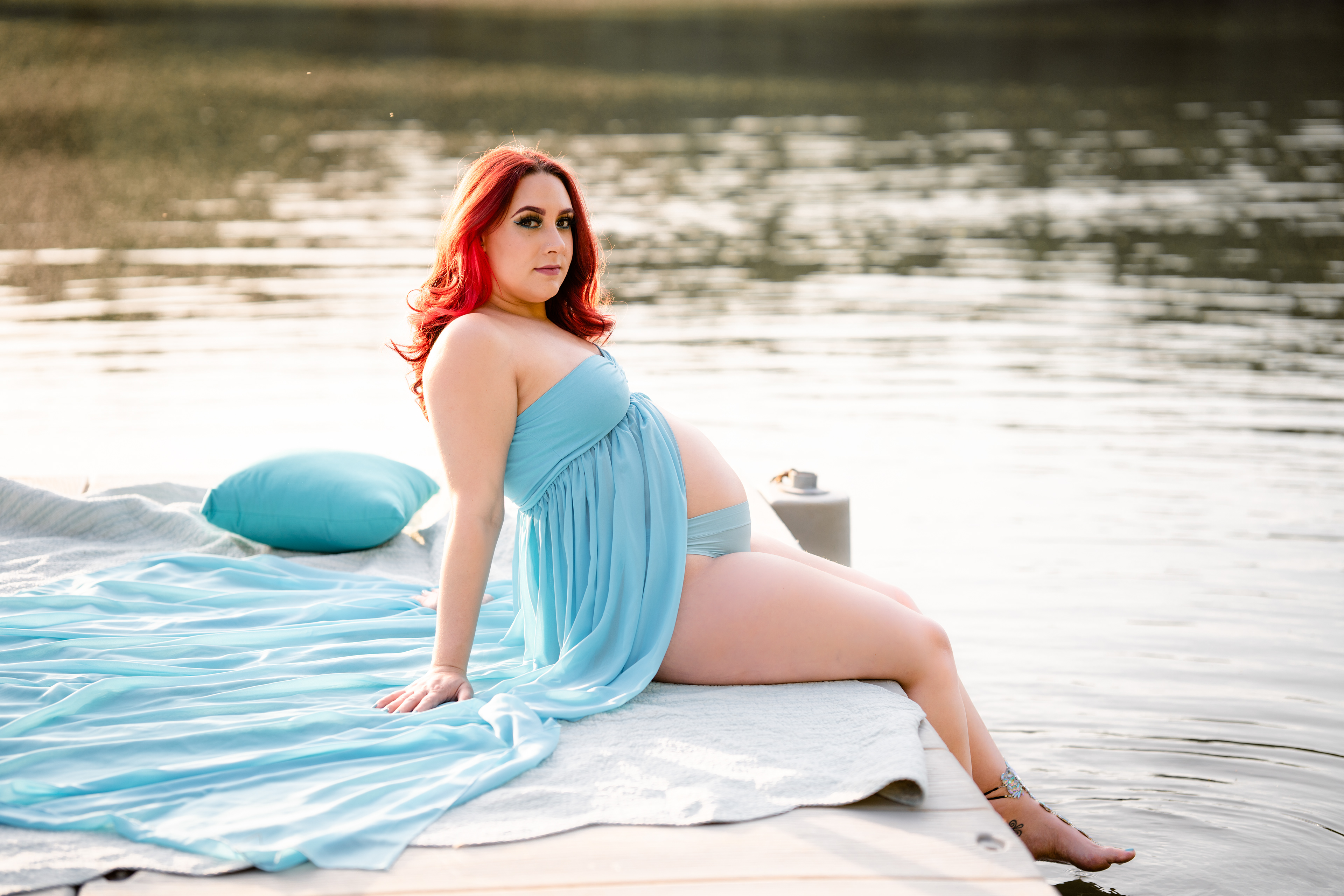 Maternity photo on river dock