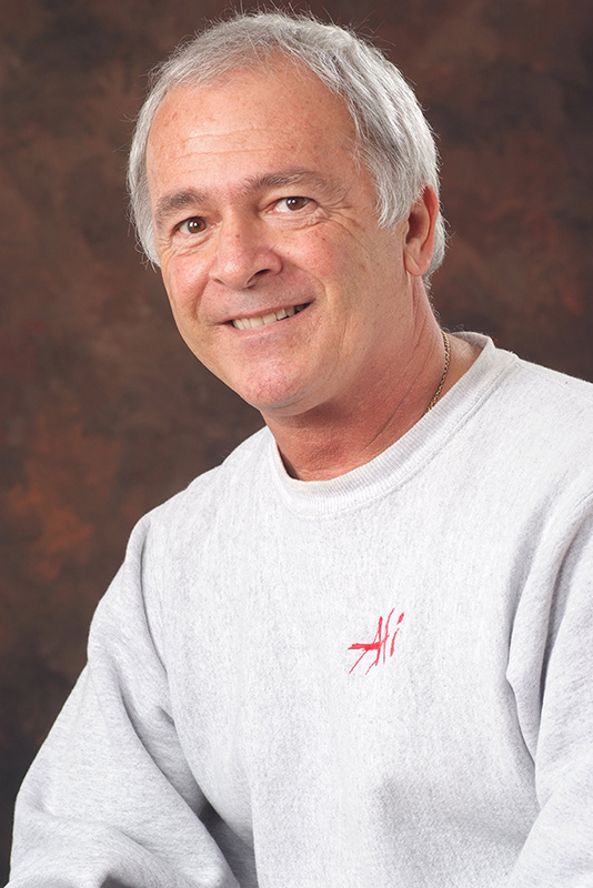 Headshot studio photo of Rick Ferro