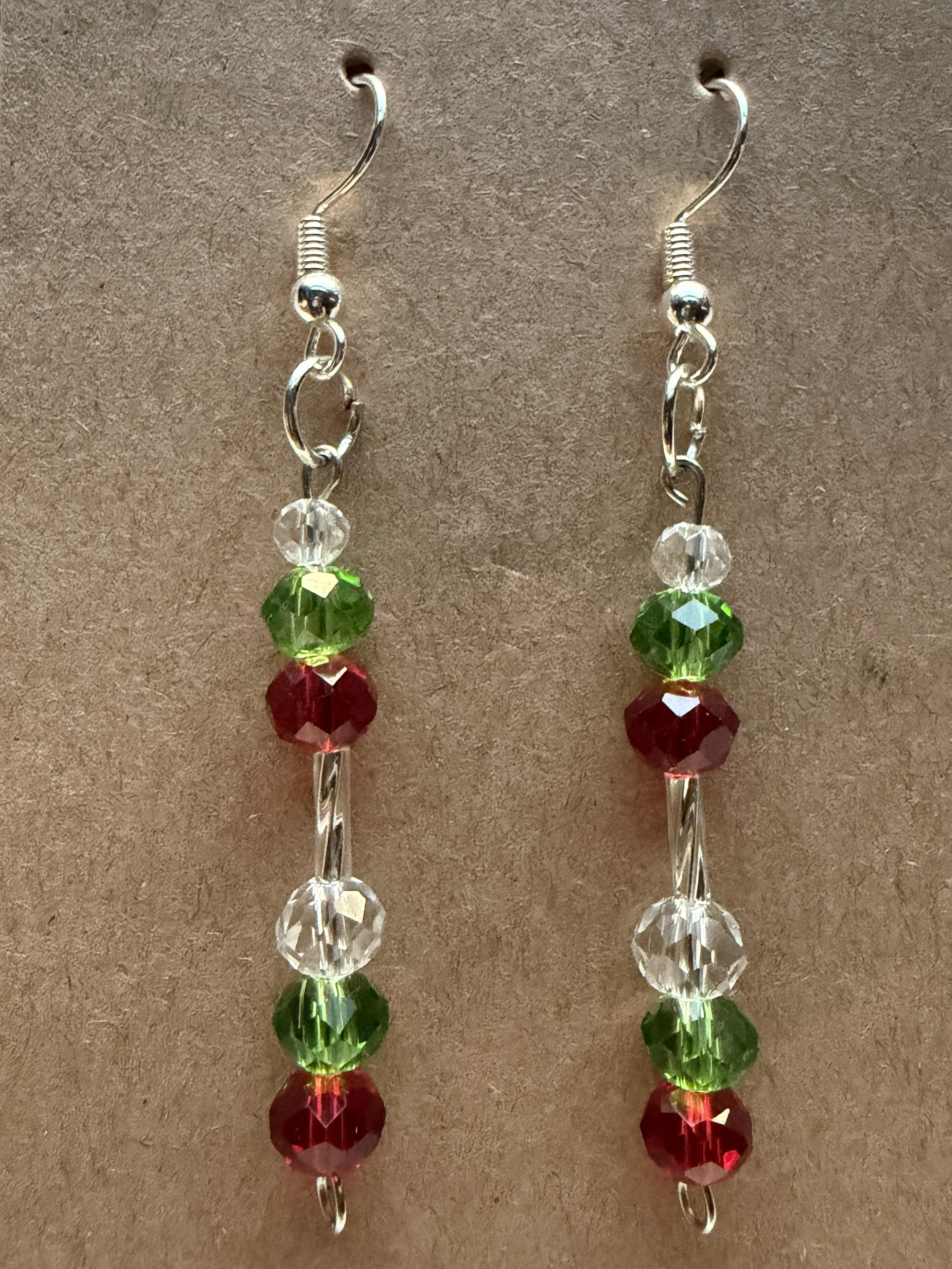 Handmade earrings with clear white, green and red beads on silver hypoallergenic posts with rubber backing Style# 001