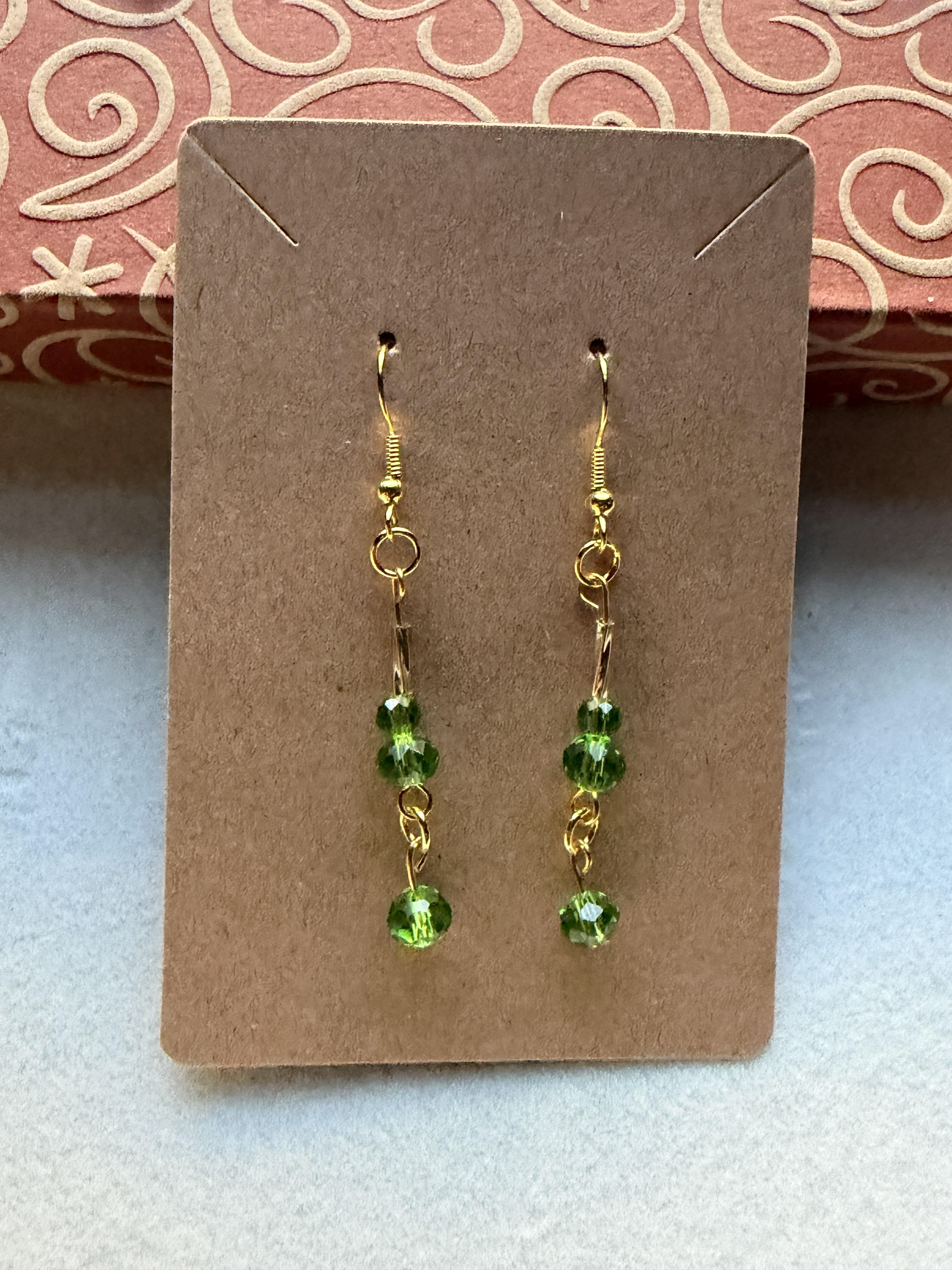 Handmade earrings with crystal green beads on gold hypoallergenic posts with rubber backing Style# 002