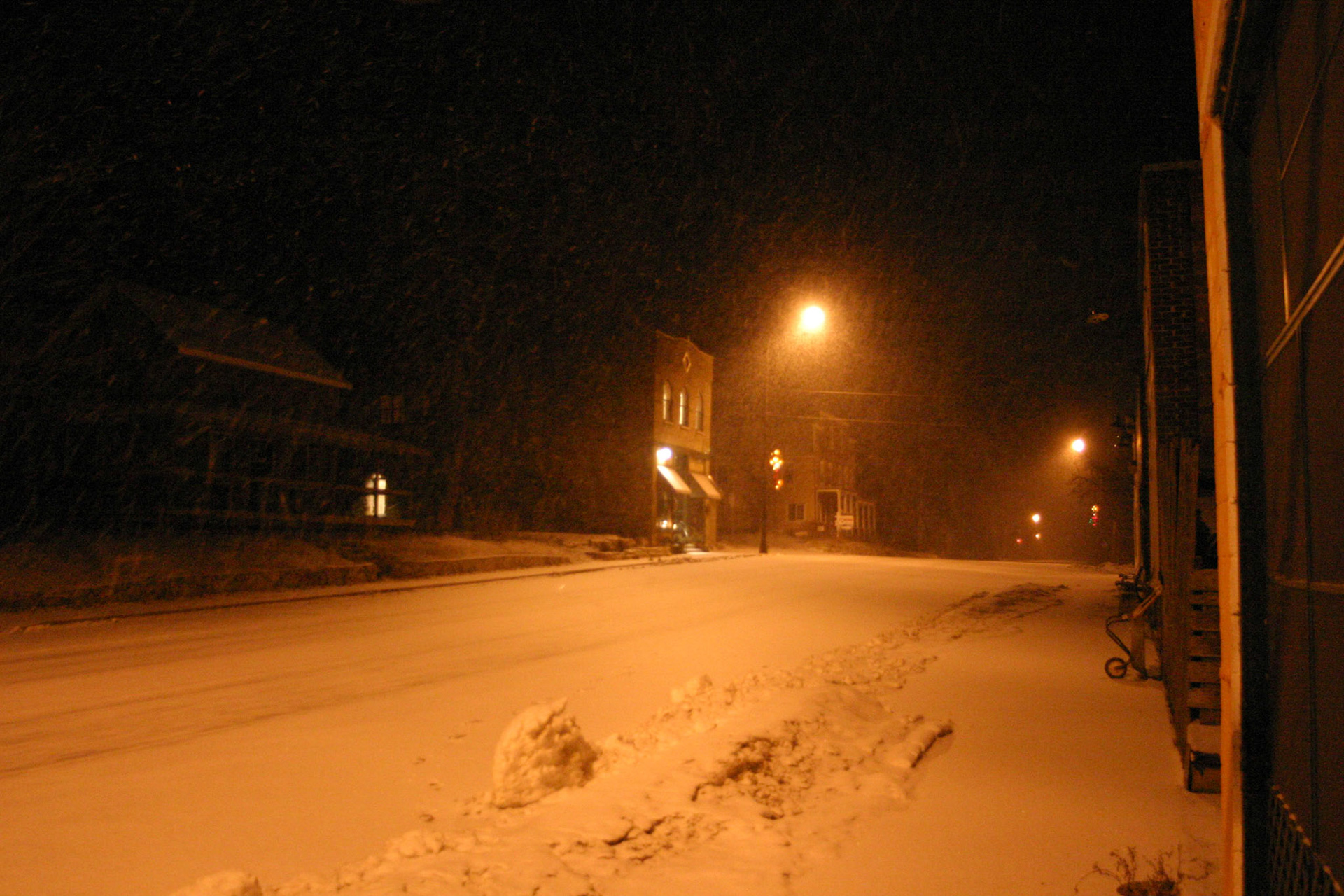 Snowy night. Stockholm, Wisconsin. Chalmers/Janus/Peterson Building.