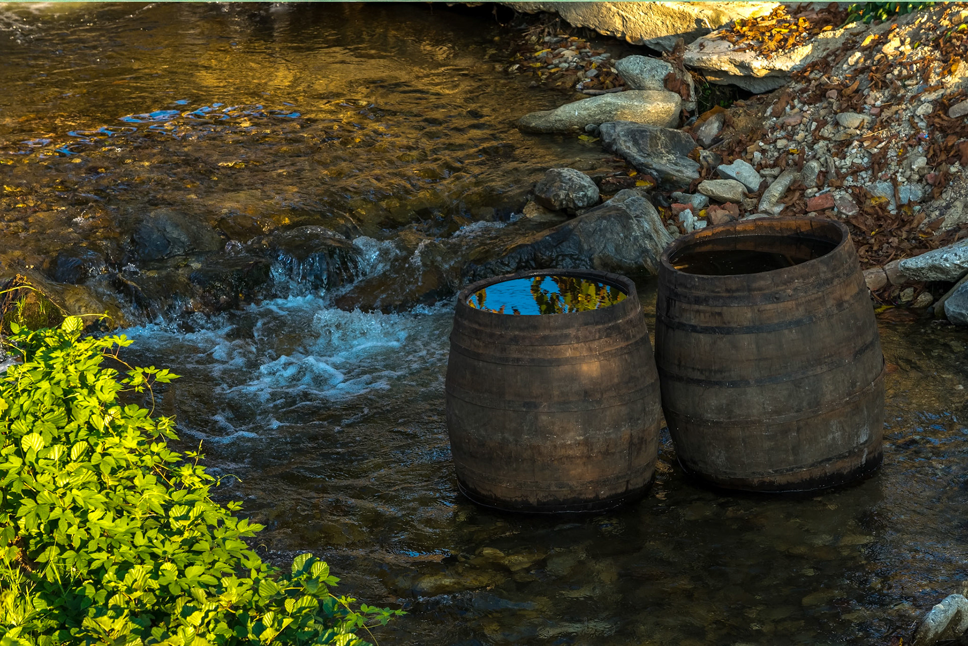 SIBIEL, TRANSYLVANIA/ROMANIA - SEPTEMBER 17 : Wooden barrels in the river at Sibiel Transylvania Romania on September 17, 2018