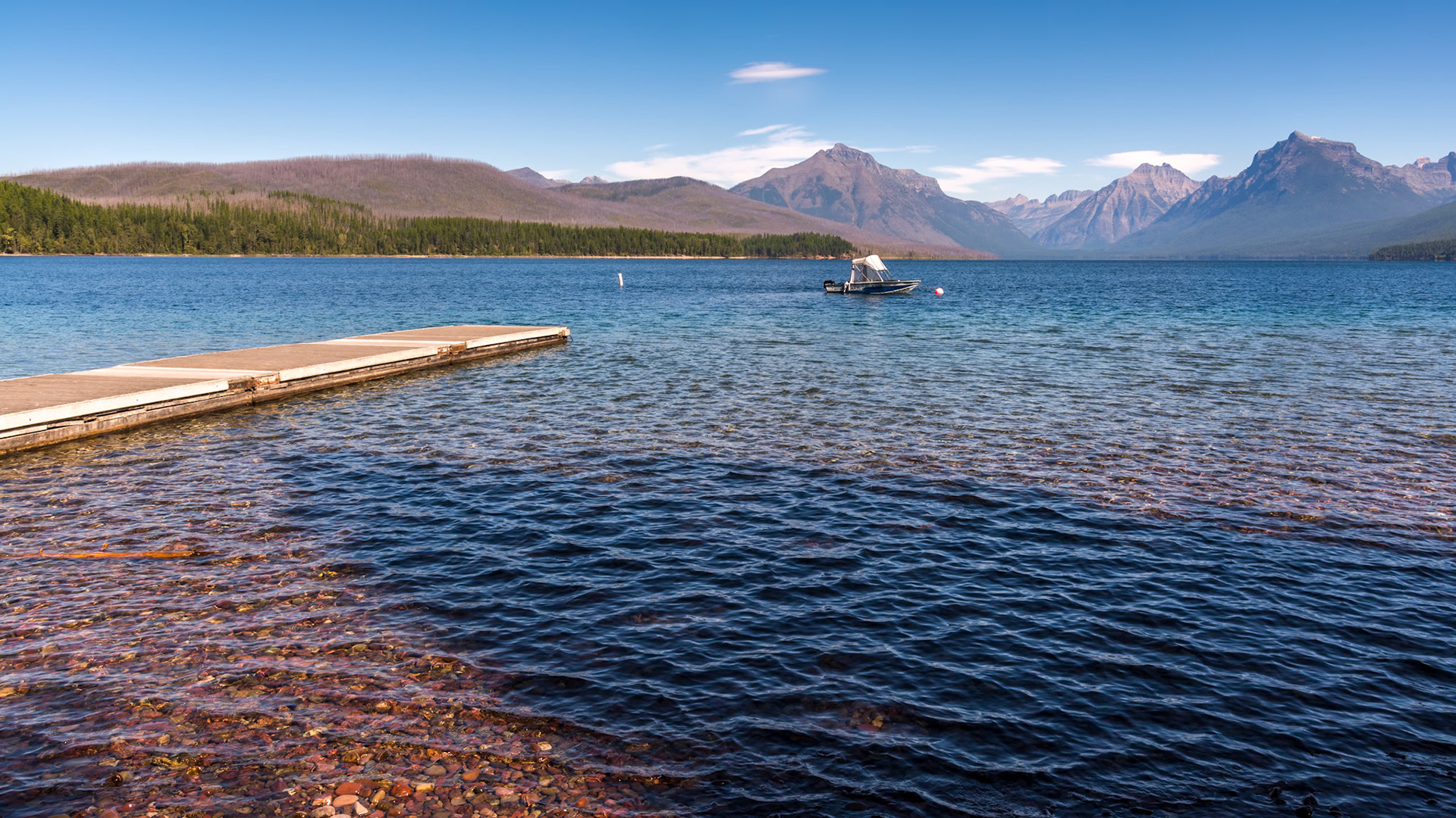 LAKE MCDONALD, MONTANA/USA - SEPTEMBER 20 : View of a boat on Lake McDonald in Montana on September 20, 2013