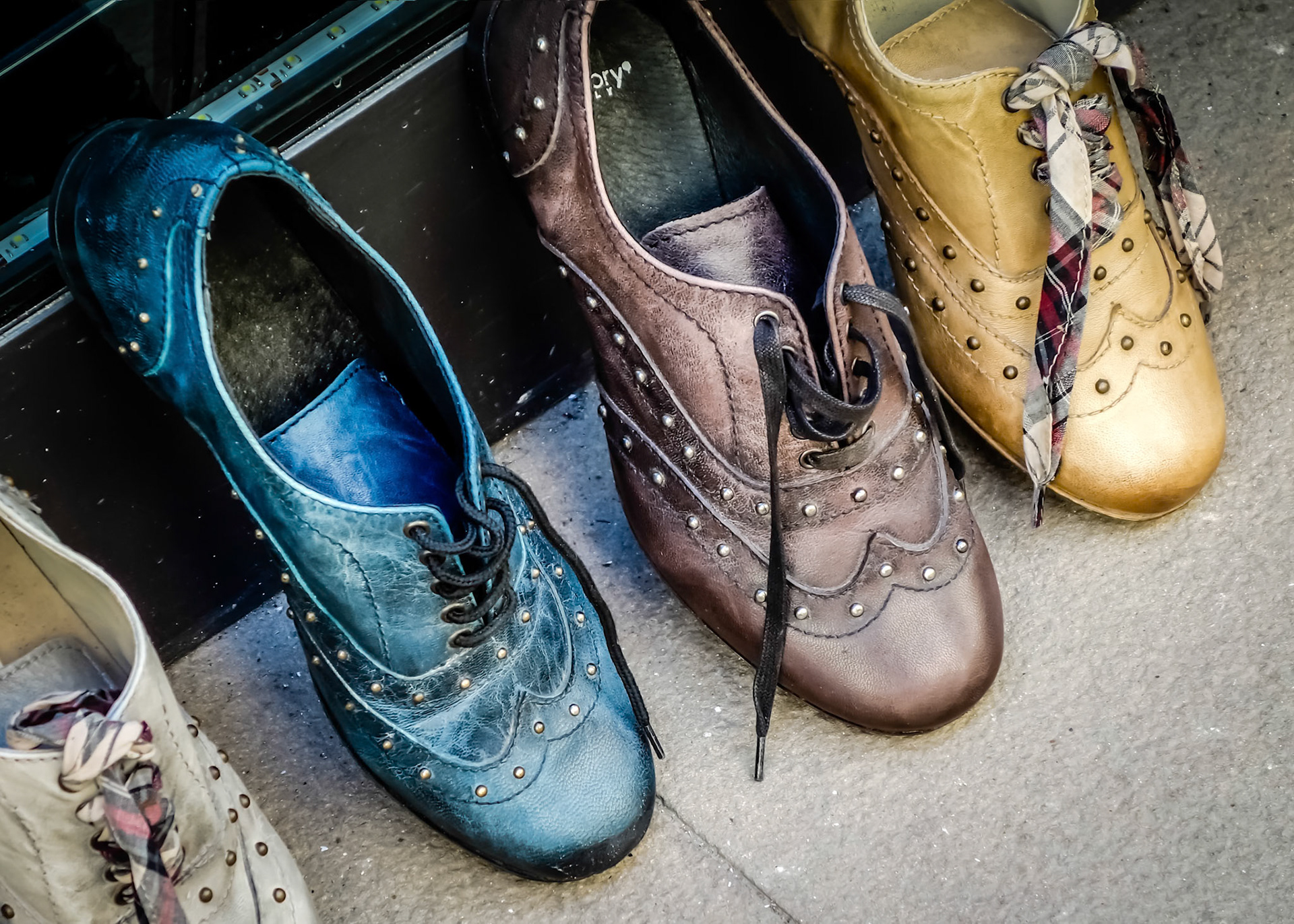 PIENZA, TUSCANY, ITALY - MAY 19 : Shoes in the street in Pienza on May 19, 2013