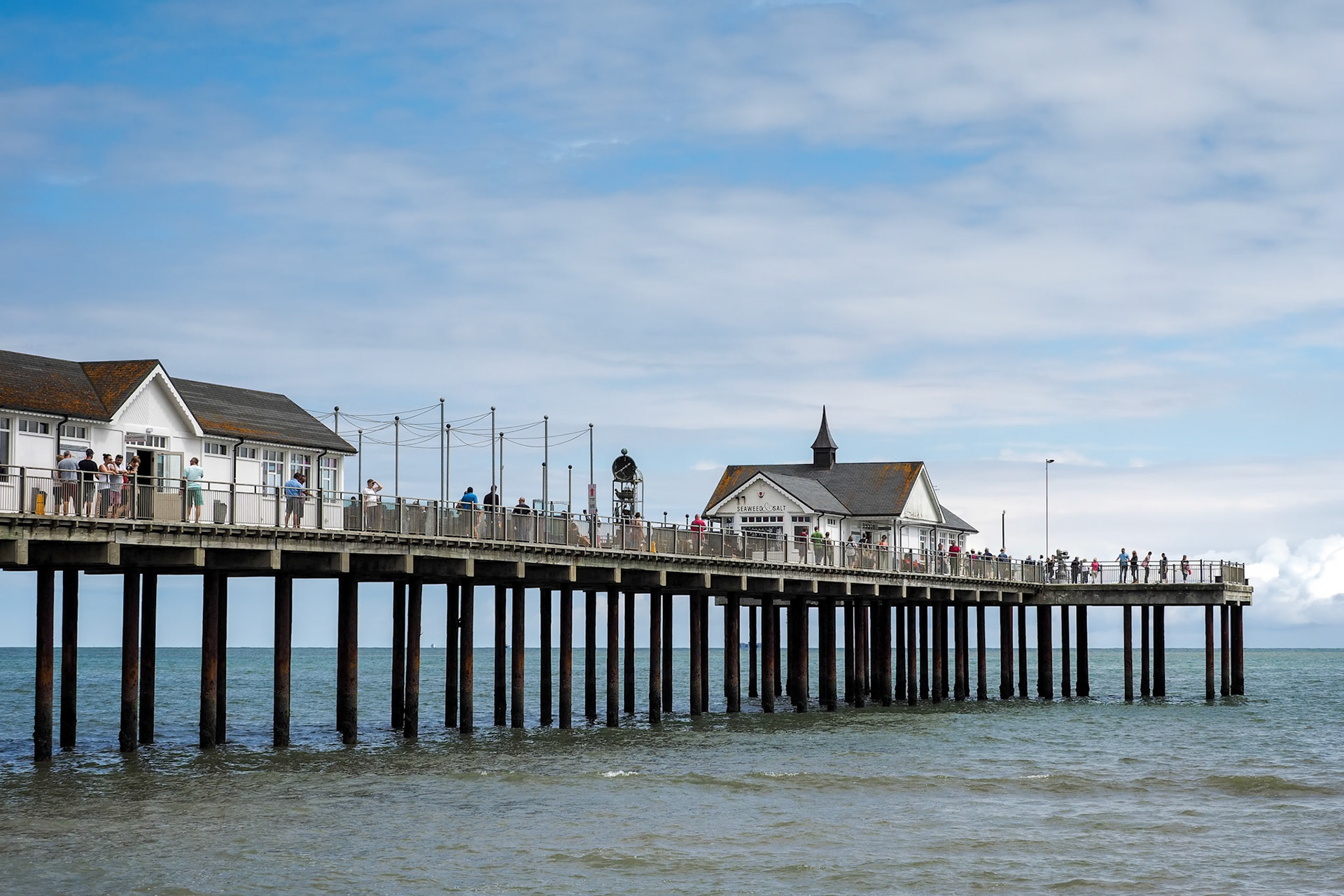 People Enjoying a Sunny Day Out on Southwold Pier