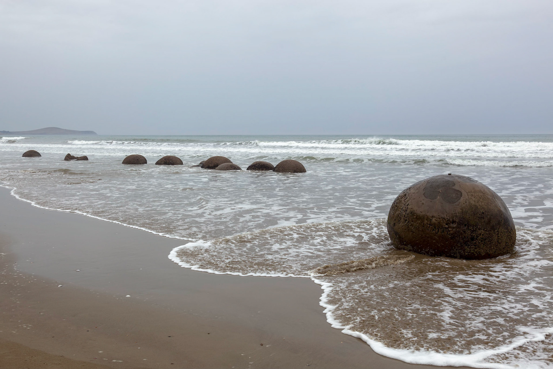 Moeraki Boulders at Koekohe Beach on the wave-cut Otago coast of New Zealand