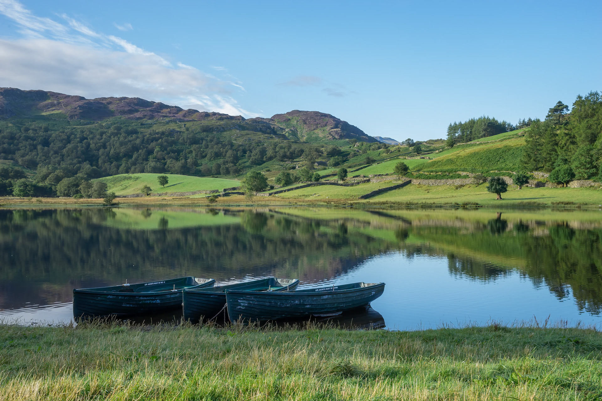 Rowing boats moored in Watendlath Tarn
