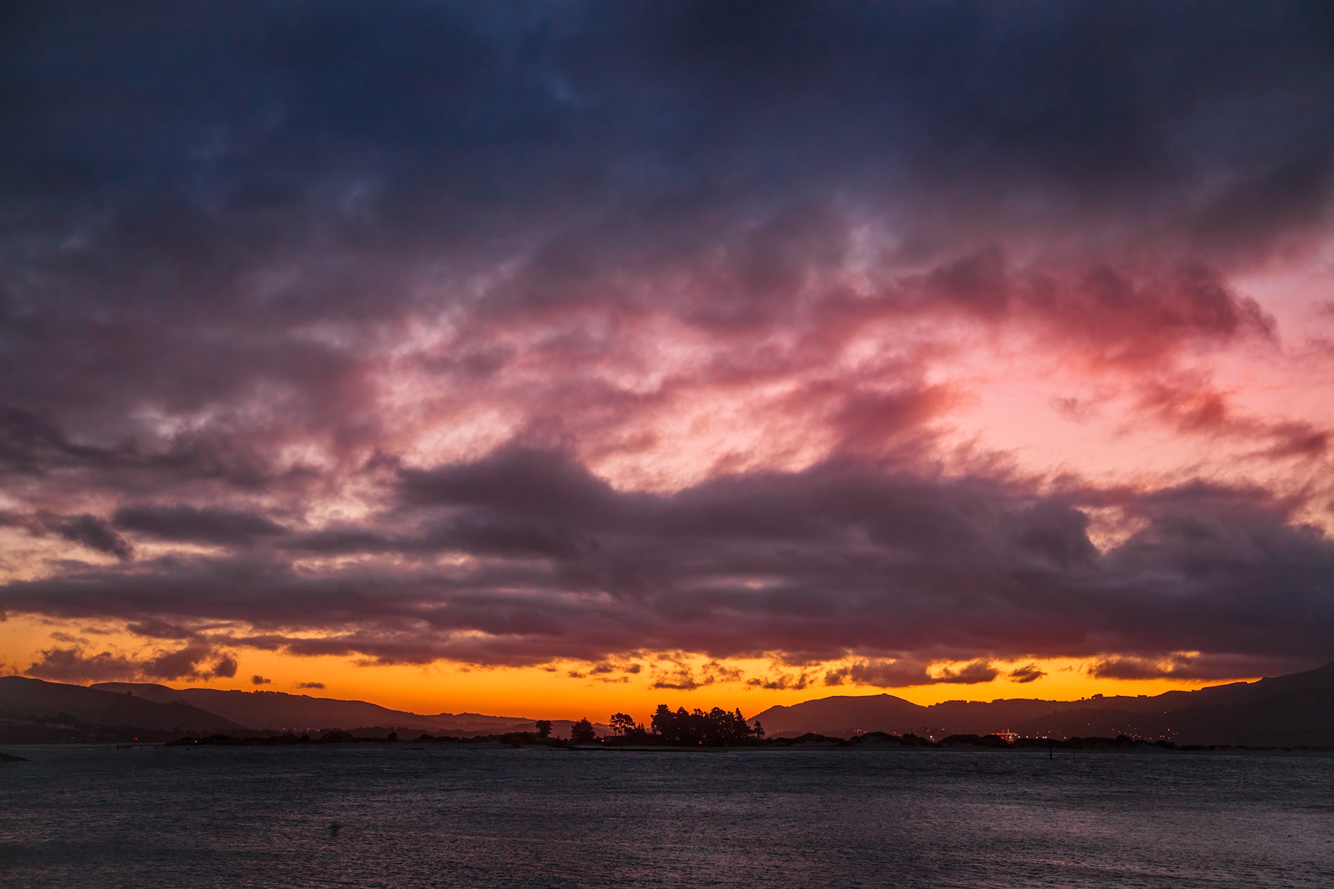 Sunset over Pilot Bay in New Zealand