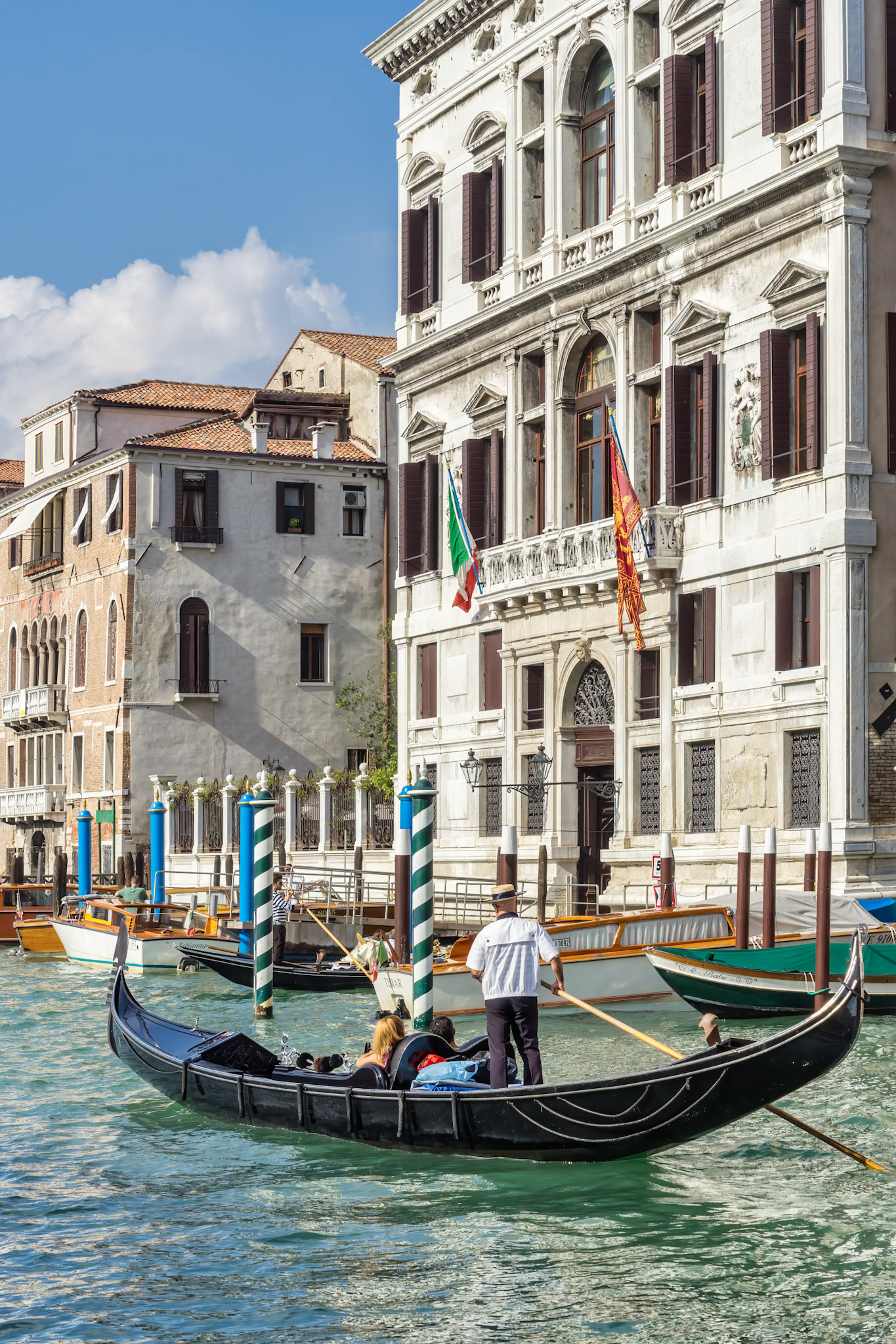 Gondolier ferrying people around Venice