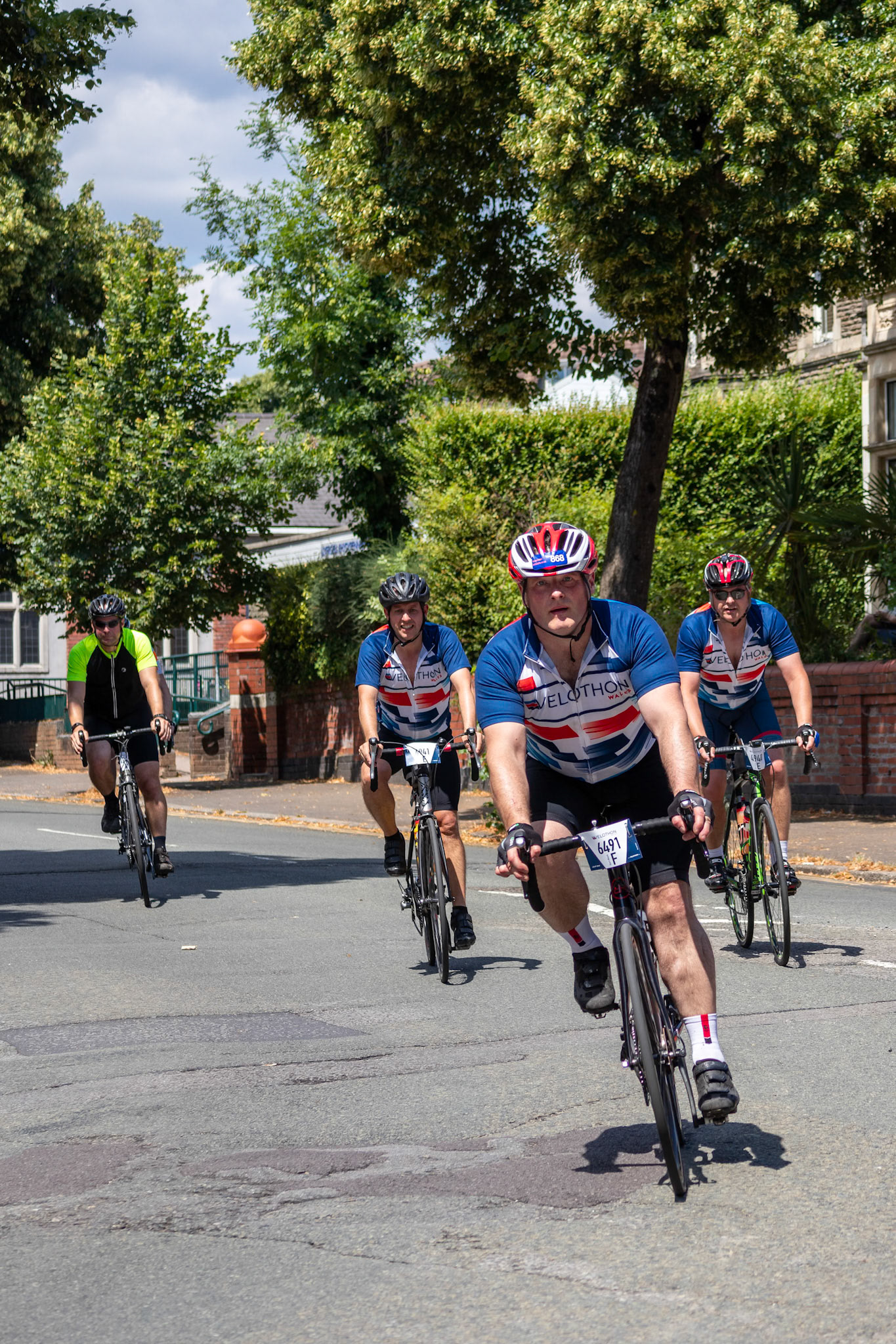 CARDIFF, WALES/UK - JULY 8 : Cyclists participating in the Velothon Cycling Event in Cardiff Wales on July 8, 2018. Four unidentified people
