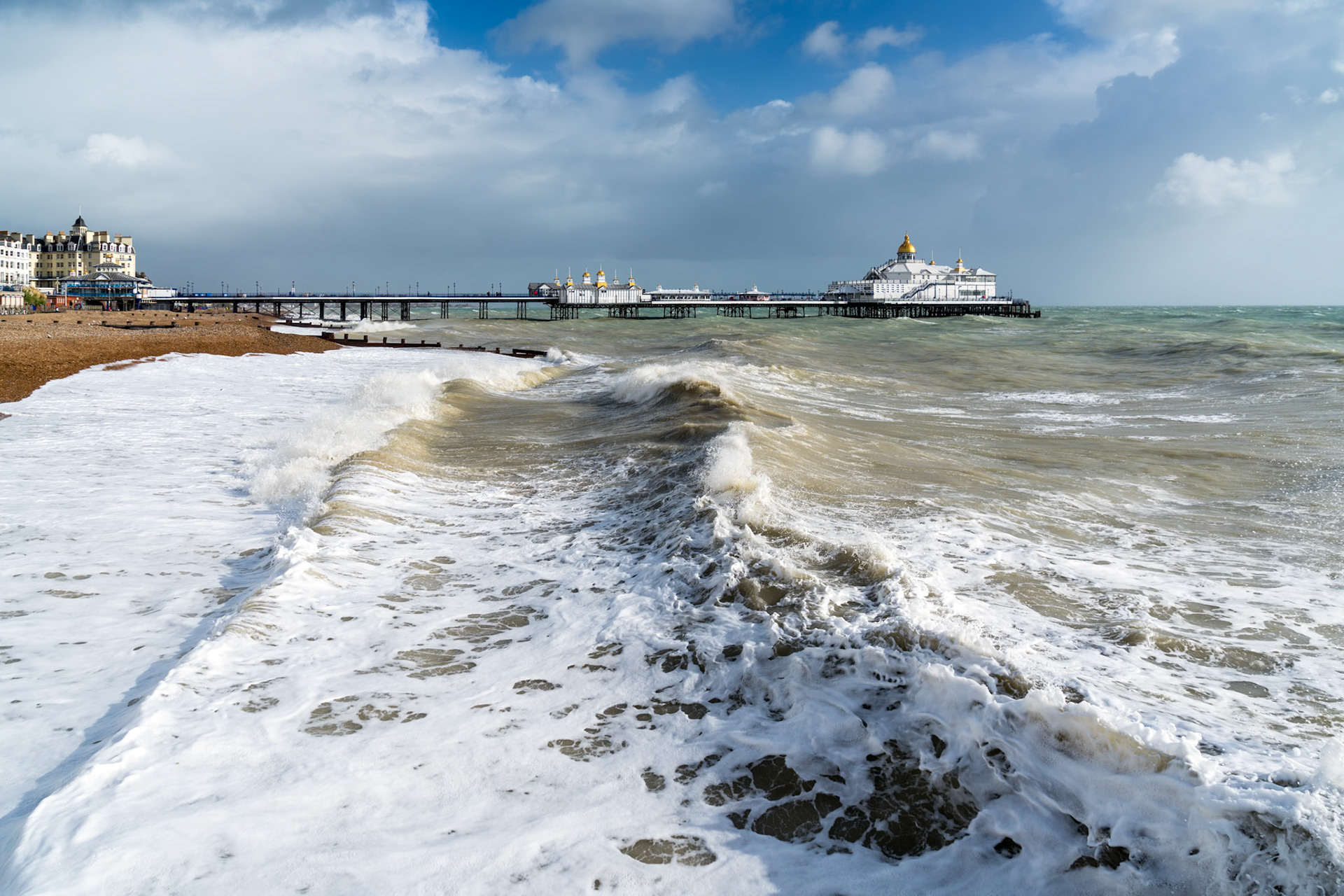 EASTBOURNE, EAST SUSSEX/UK - OCTOBER 21 : Tail End of Storm Brian Racing Past Eastbourne Pier in East Sussex on October 21, 2017