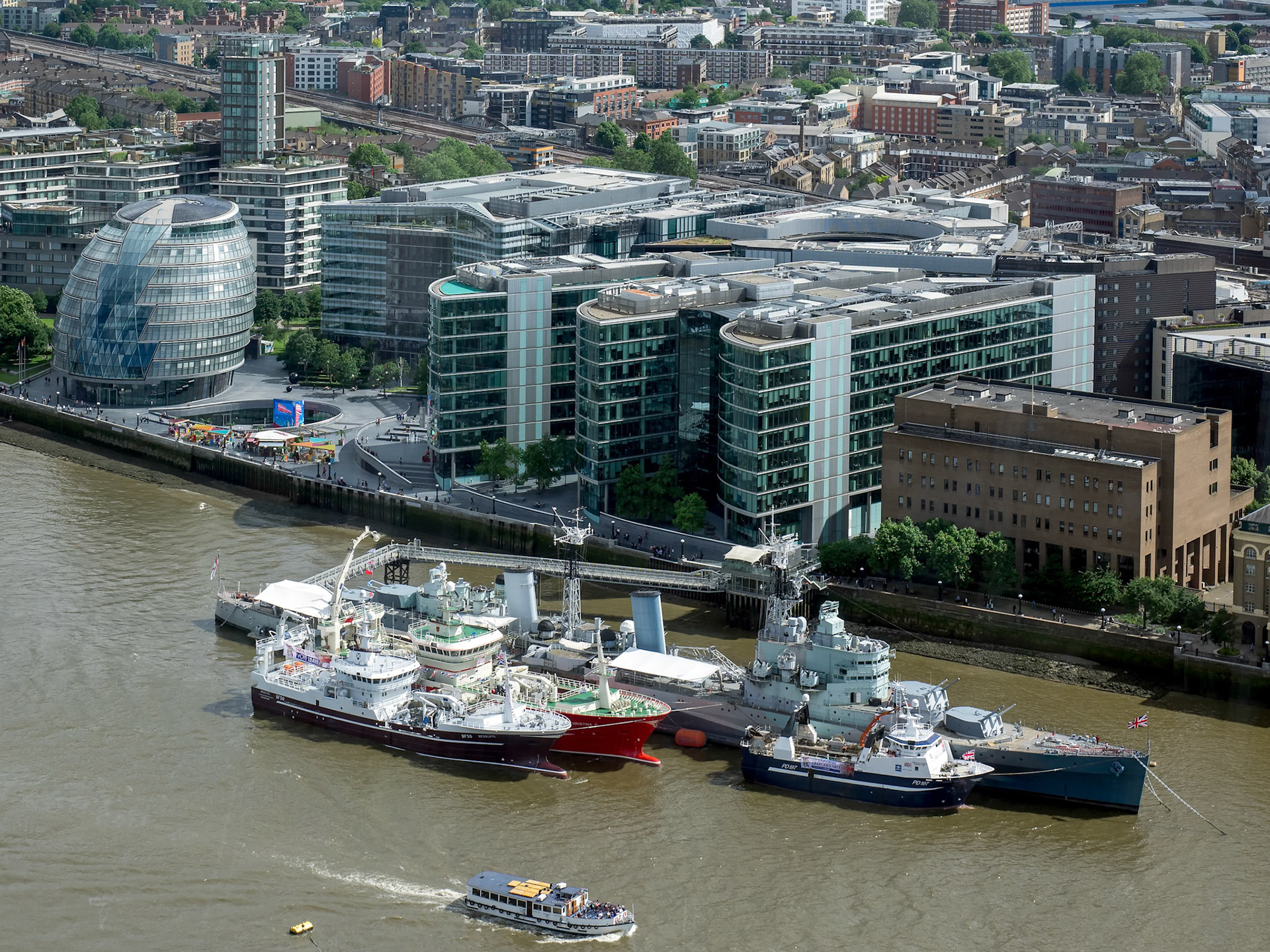HMS Belfast and other Boats Moored in the Thames