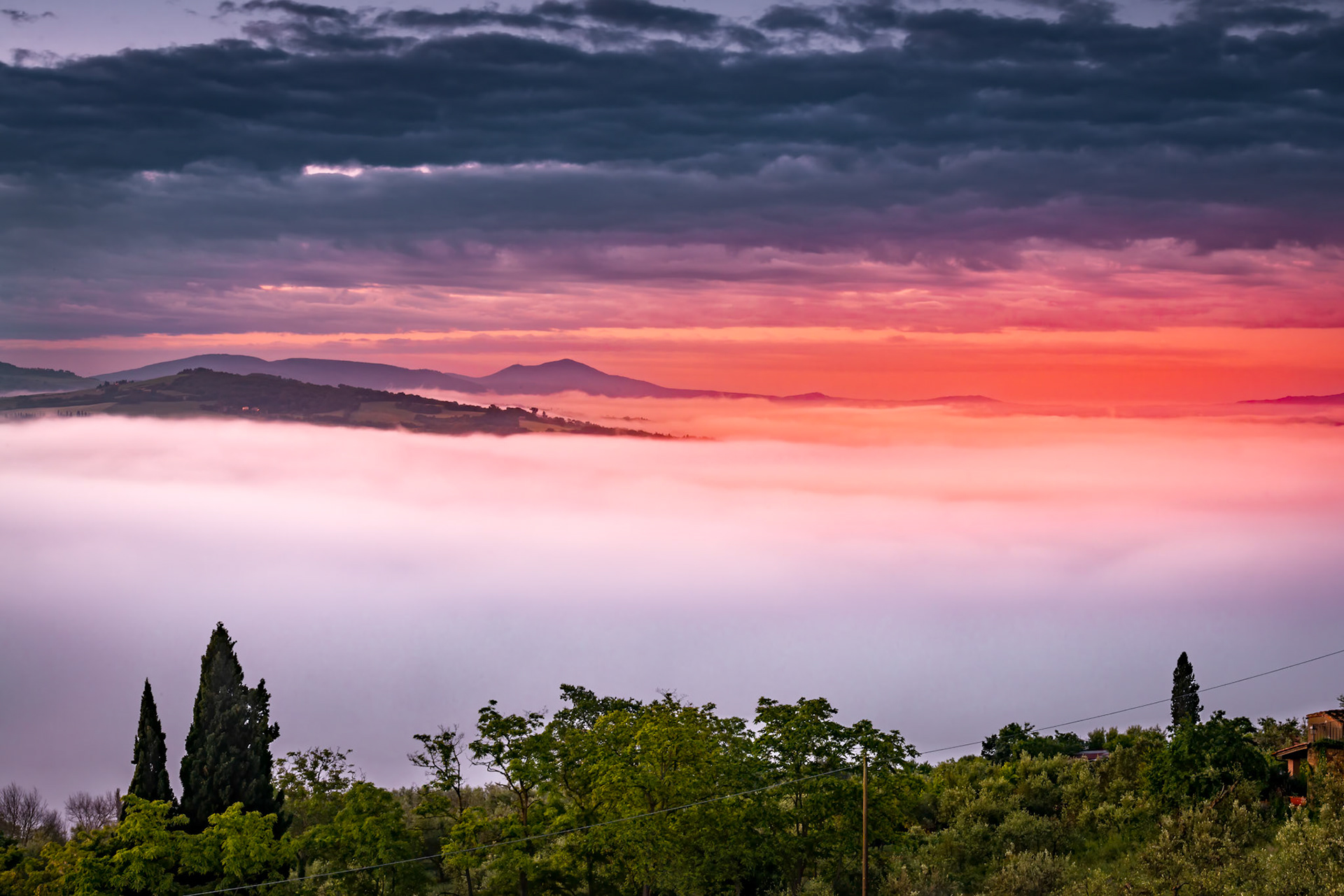 Sunrise over Val d'Orcia in Tuscany
