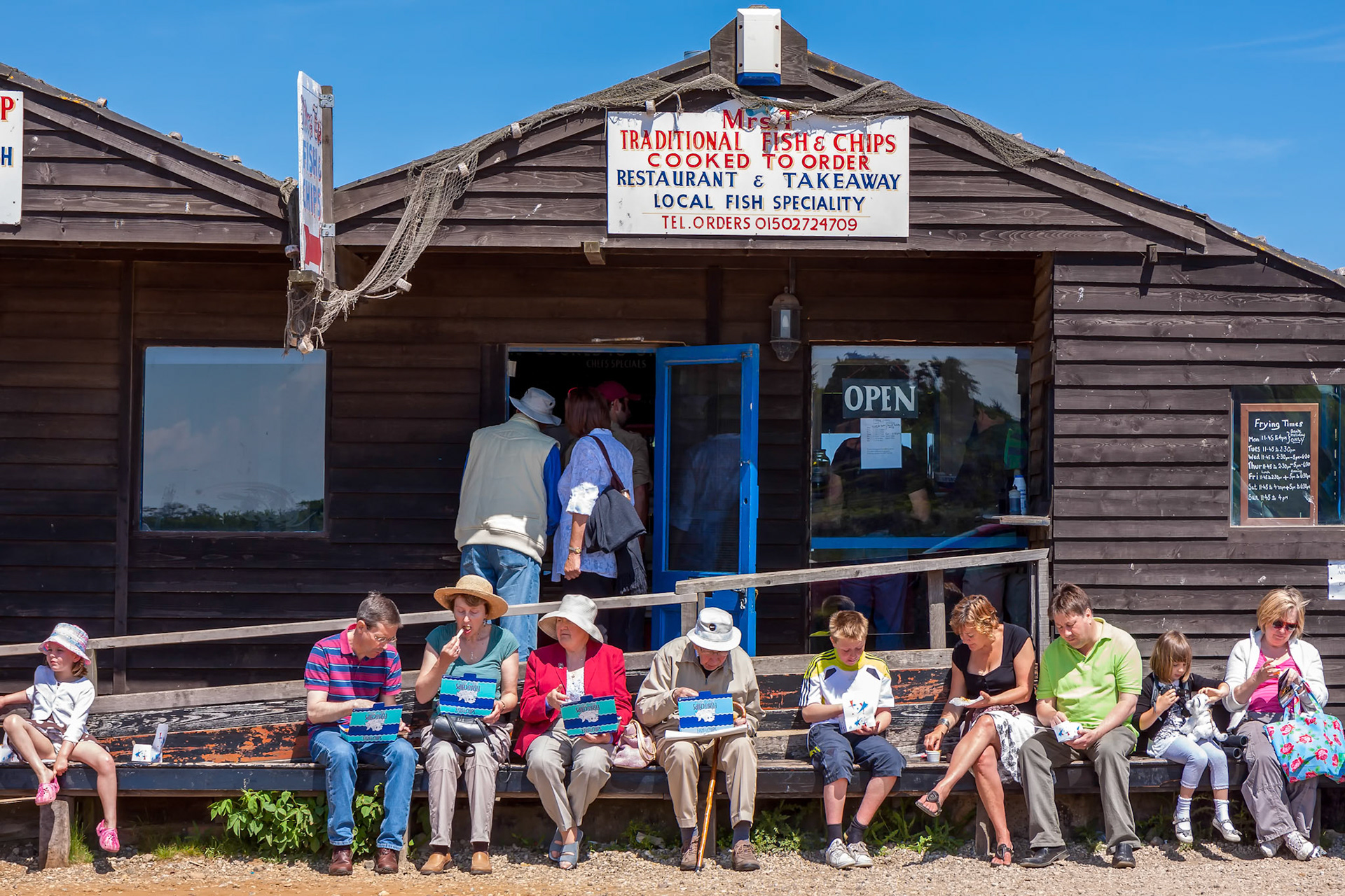 People Enjoying Fish and Chips in Southwold