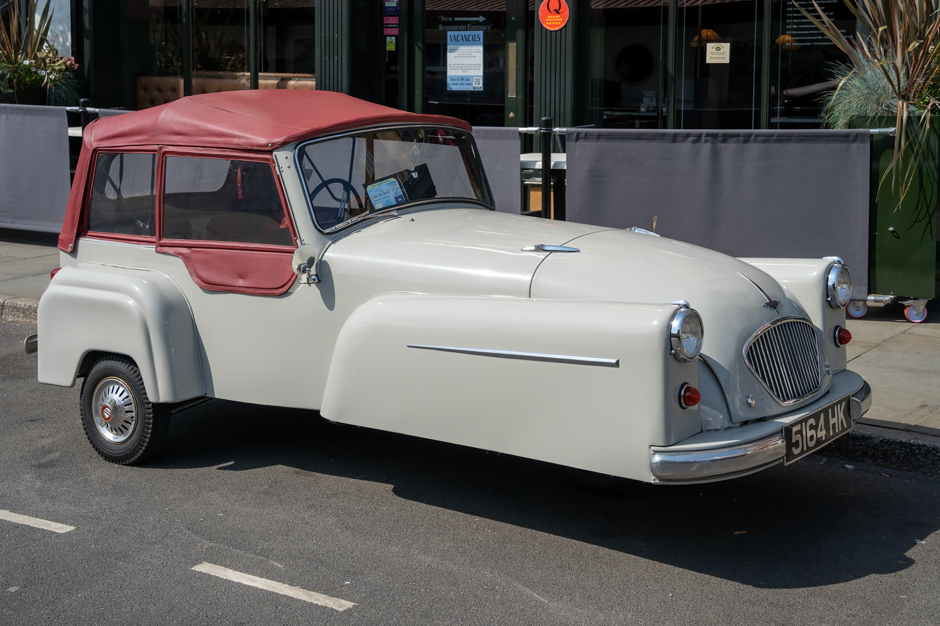WHITBY,  NORTH YORKSHIRE, UK - JULY 19: Old Bond three wheeler in Whitby, North Yorkshire on July 19, 2022